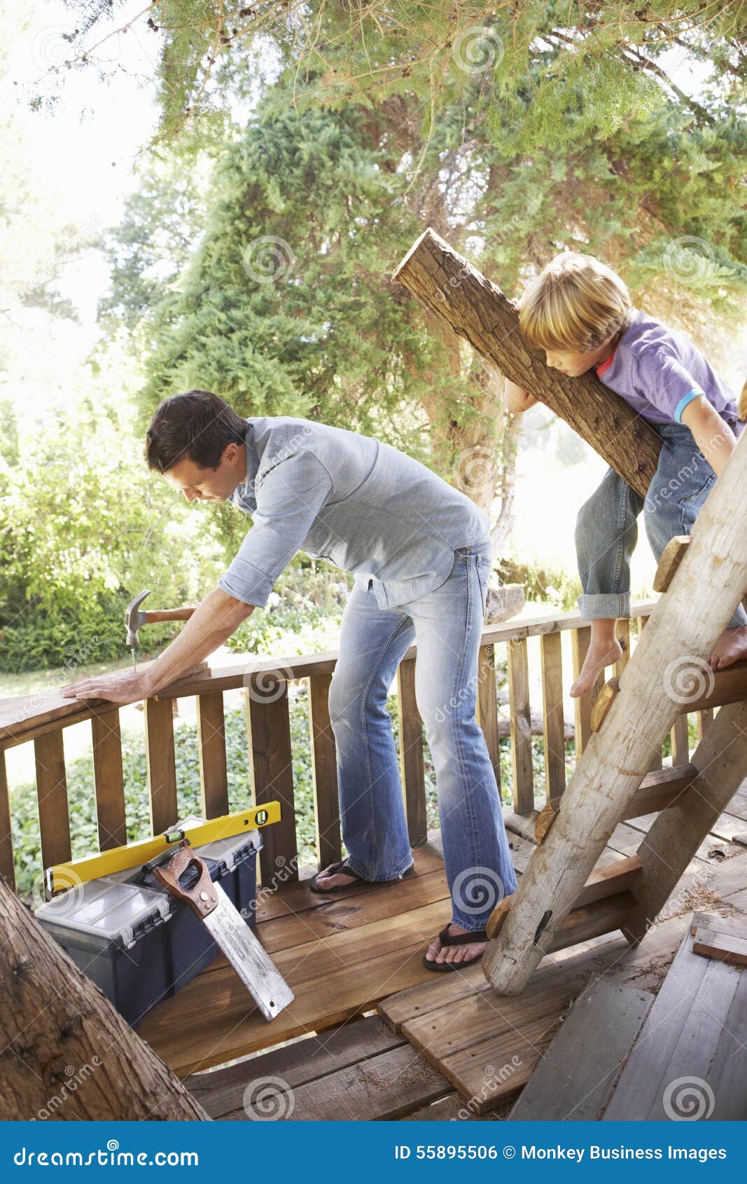 Father And Son Building  Tree House  Together Stock Photo 