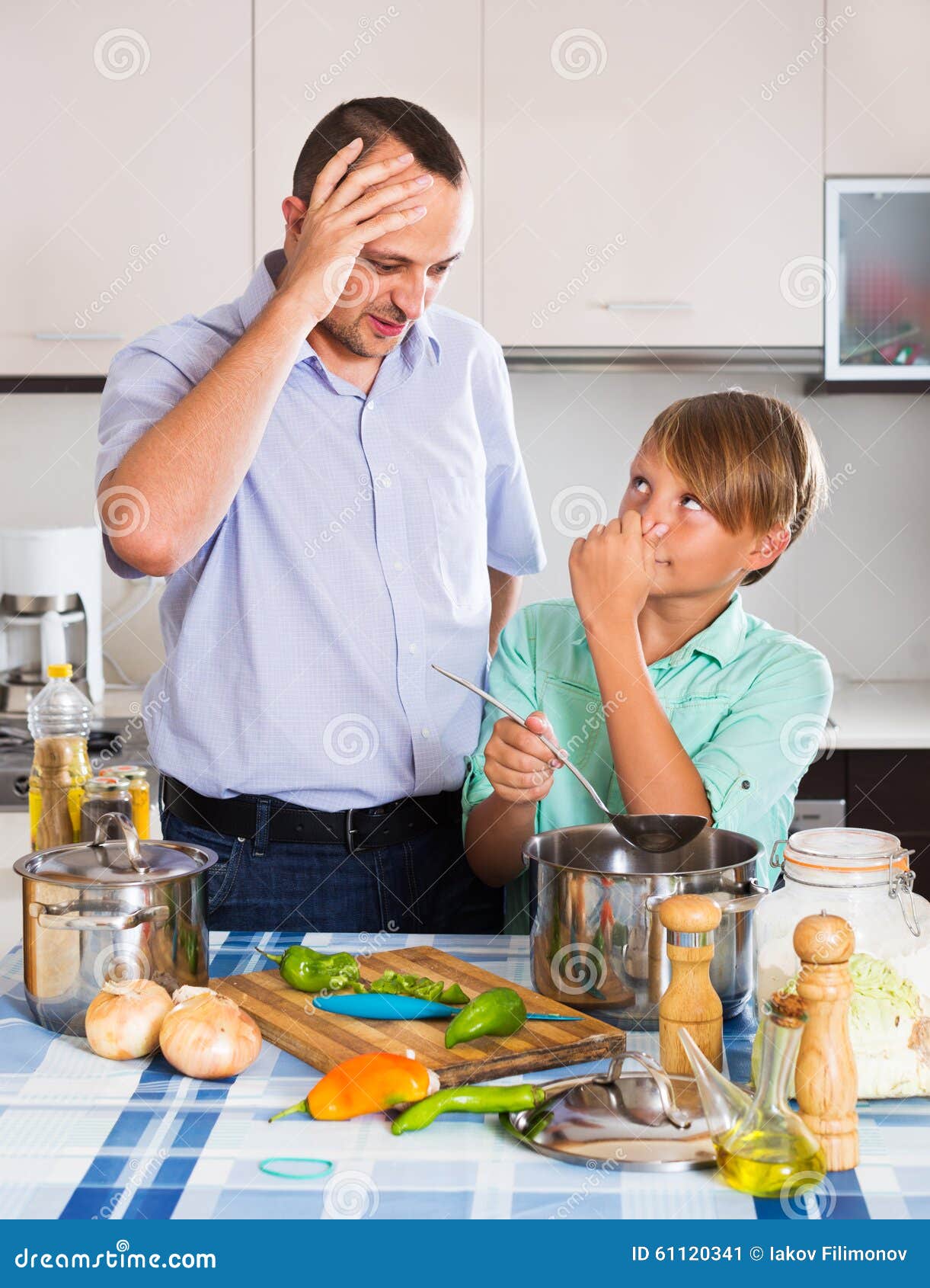Father and Son Cooking Dinner Stock Image Image of ladle, caucasian