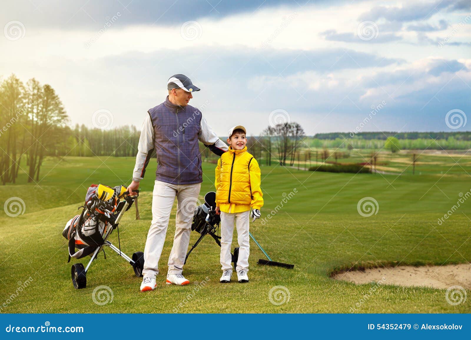 Father with son at golf stock image. Image of parent - 54352479