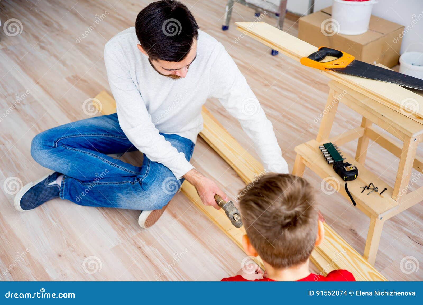 Father and Son Hammering Nails Stock Photo Image of male, metal 91552074