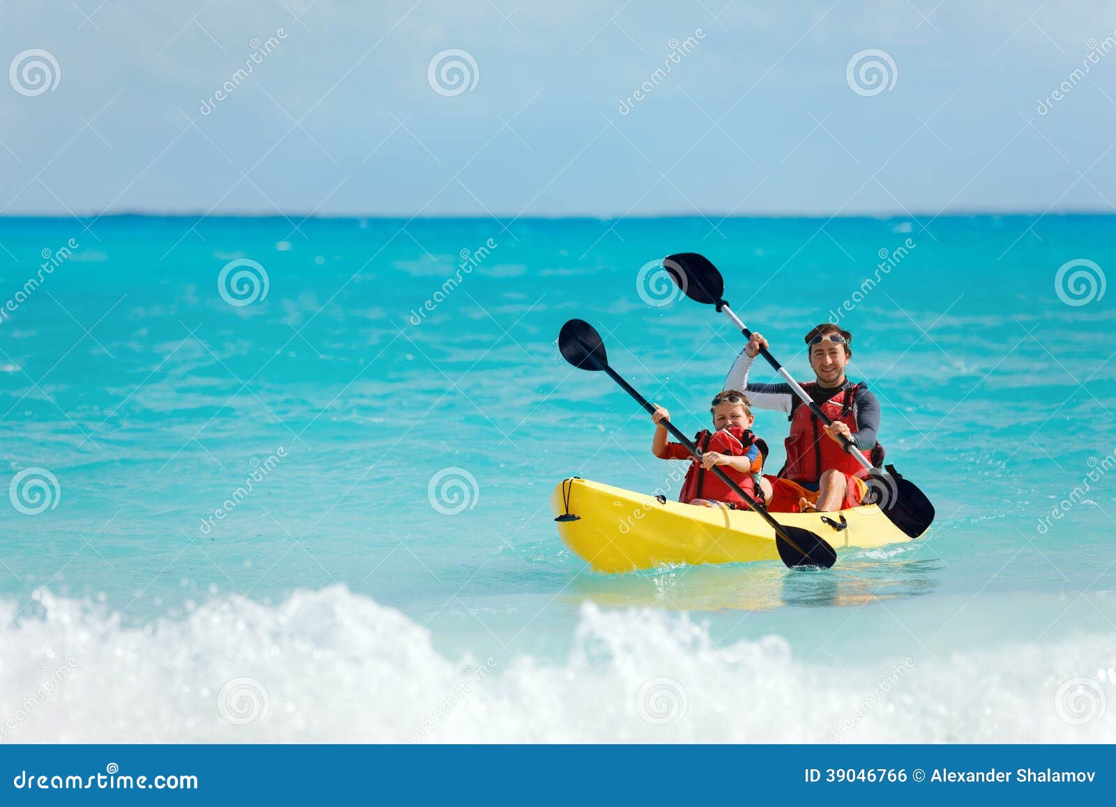 father and son kayaking