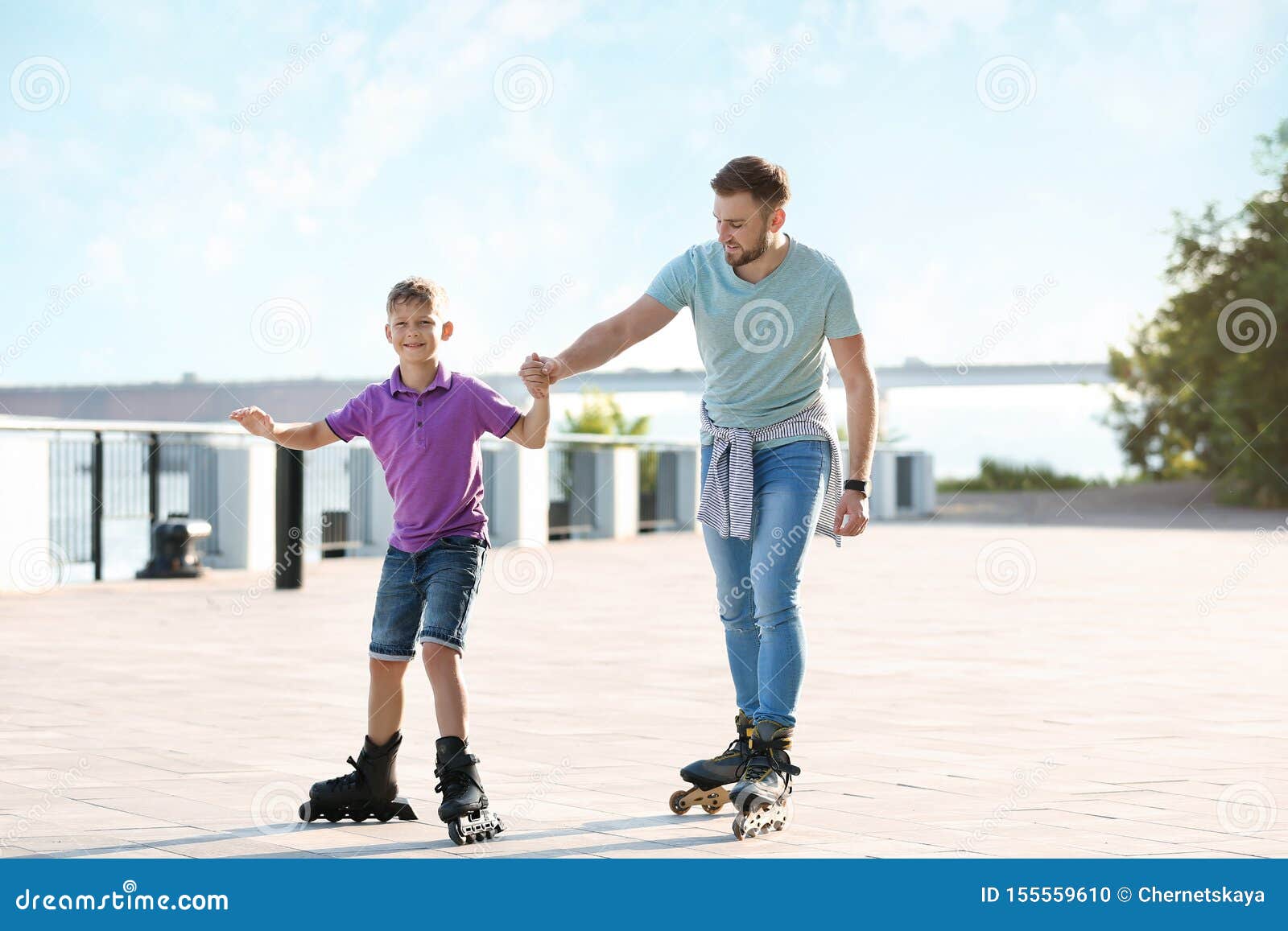 Father and Son Roller Skating on Street Stock Photo Image of hipster