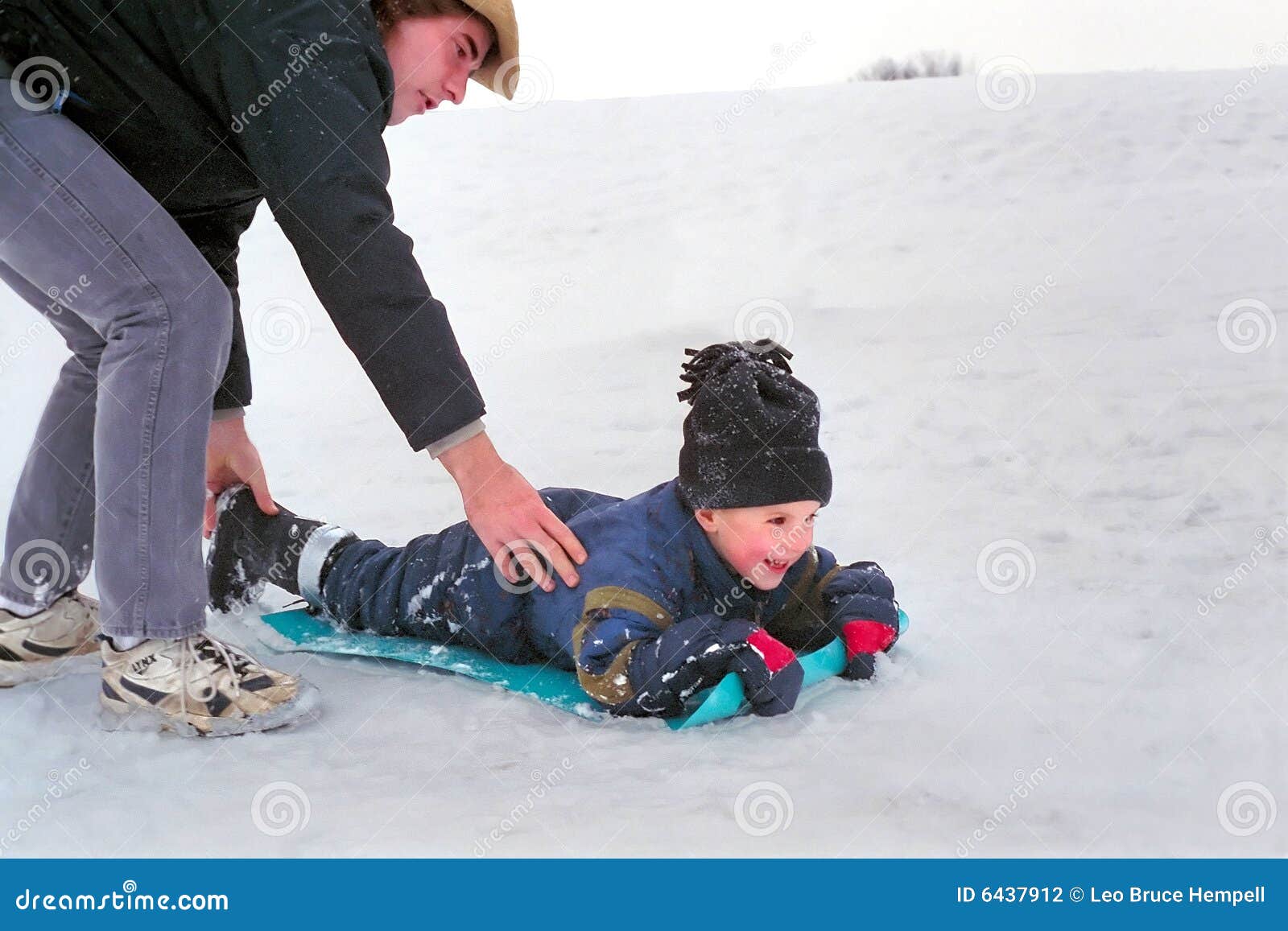 Father and Son Snow Sledding, Ontario Canada Stock Photo Image of