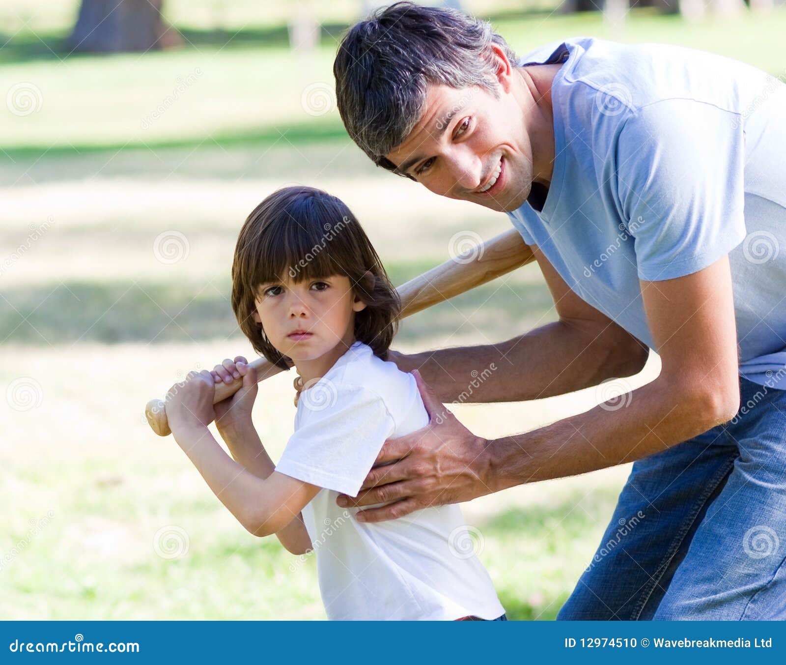 Father Teaching His Son How To Play Baseball Stock Photo Image of