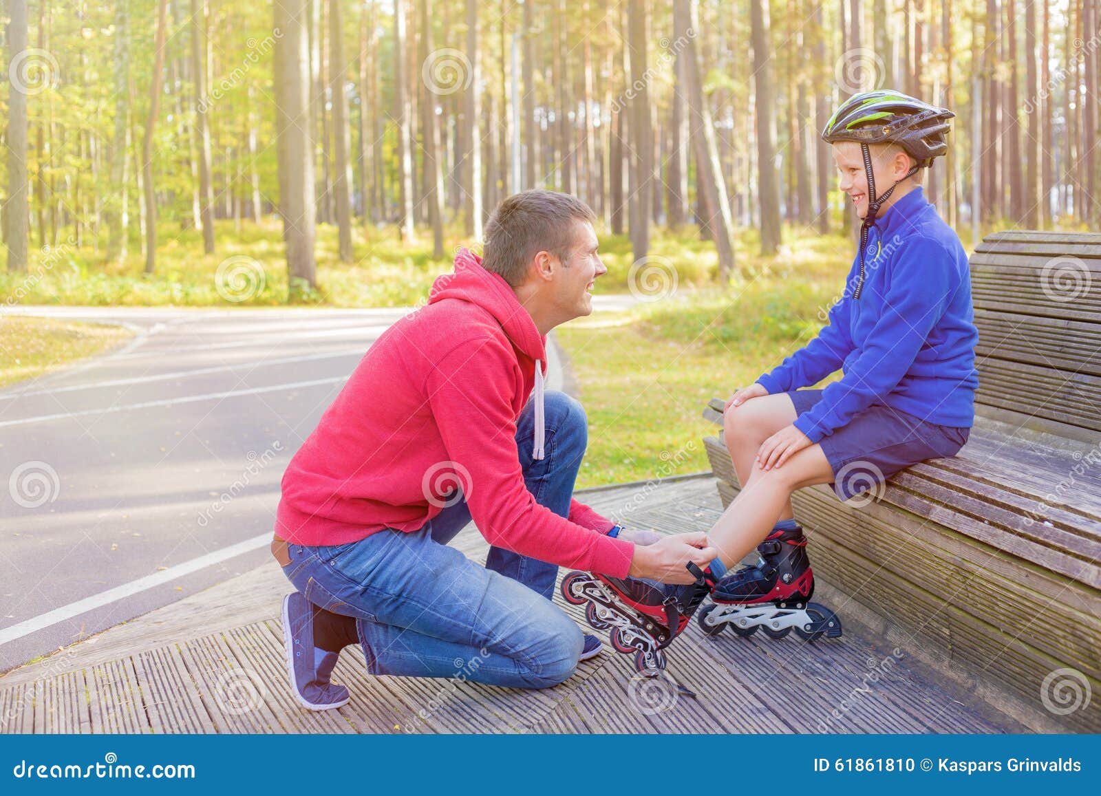 father-tying-sons-roller-skates-stock-photo-image-of-family-cute