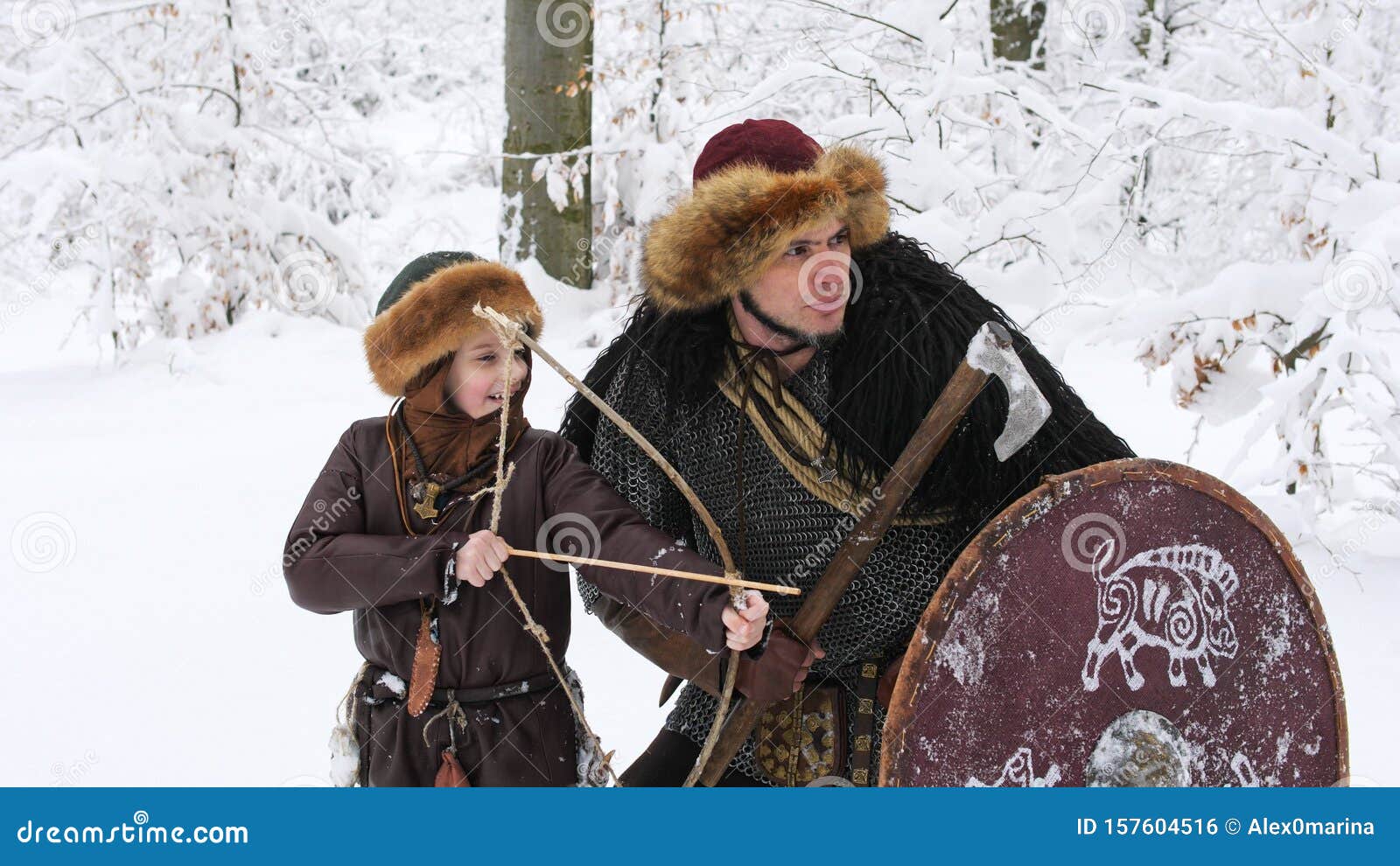 Download Father Viking Teach His Son To Archery In The Winter Forest. Stock Photo - Image of historical ...
