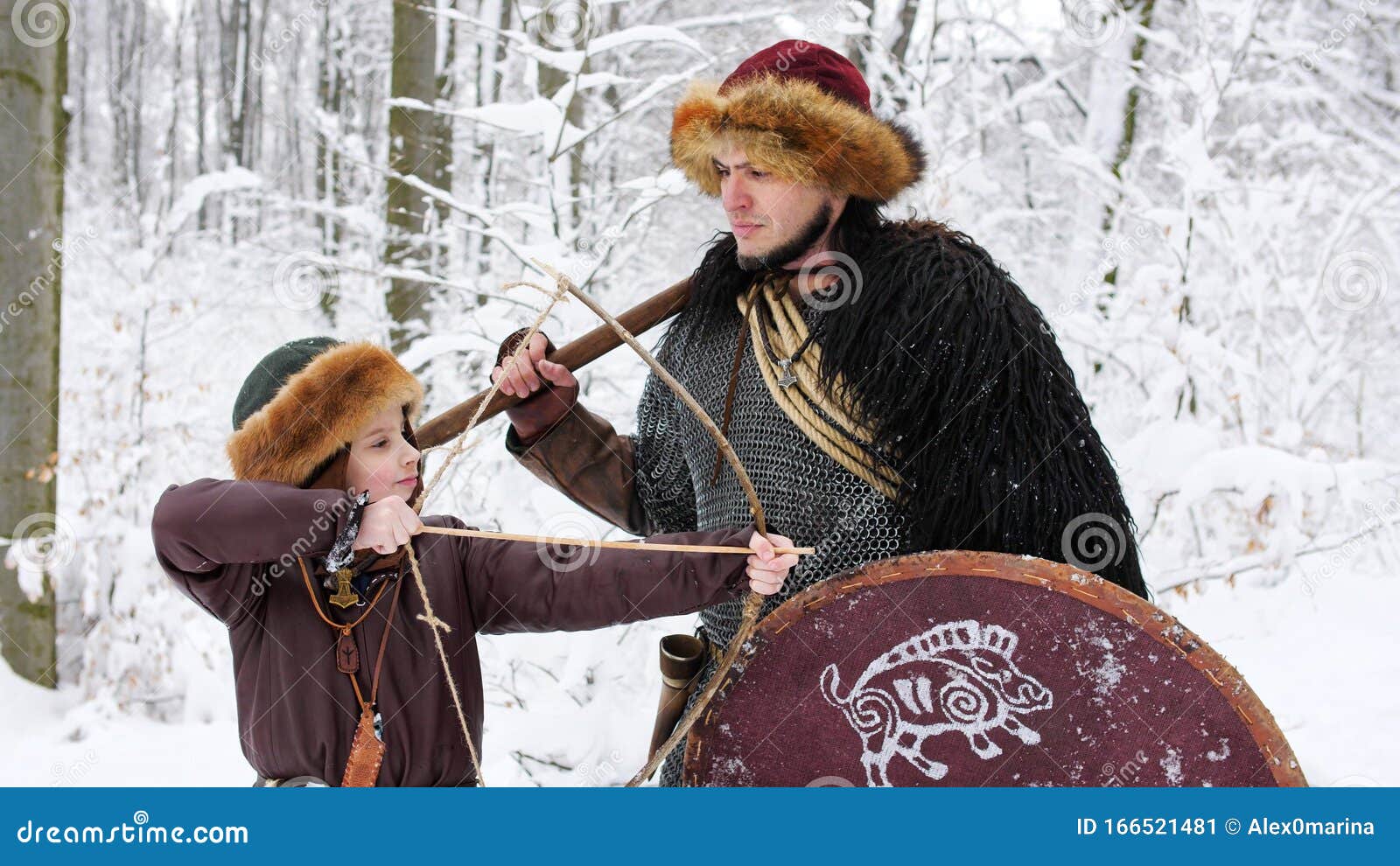 Download Father Viking Teach His Son To Archery In The Winter Forest. Stock Image - Image of nature ...