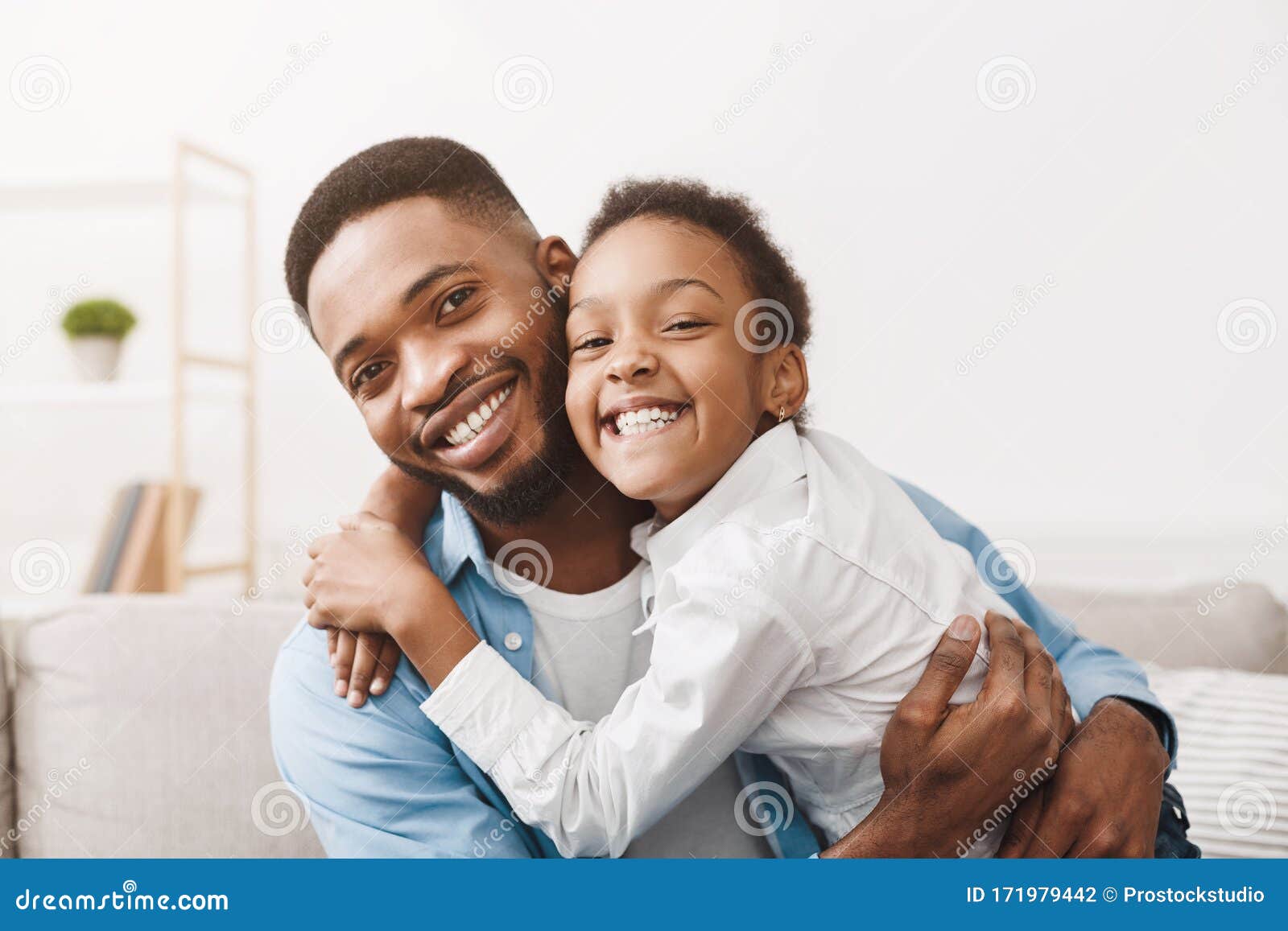 fatherhood concept. lovely father and daughter embracing