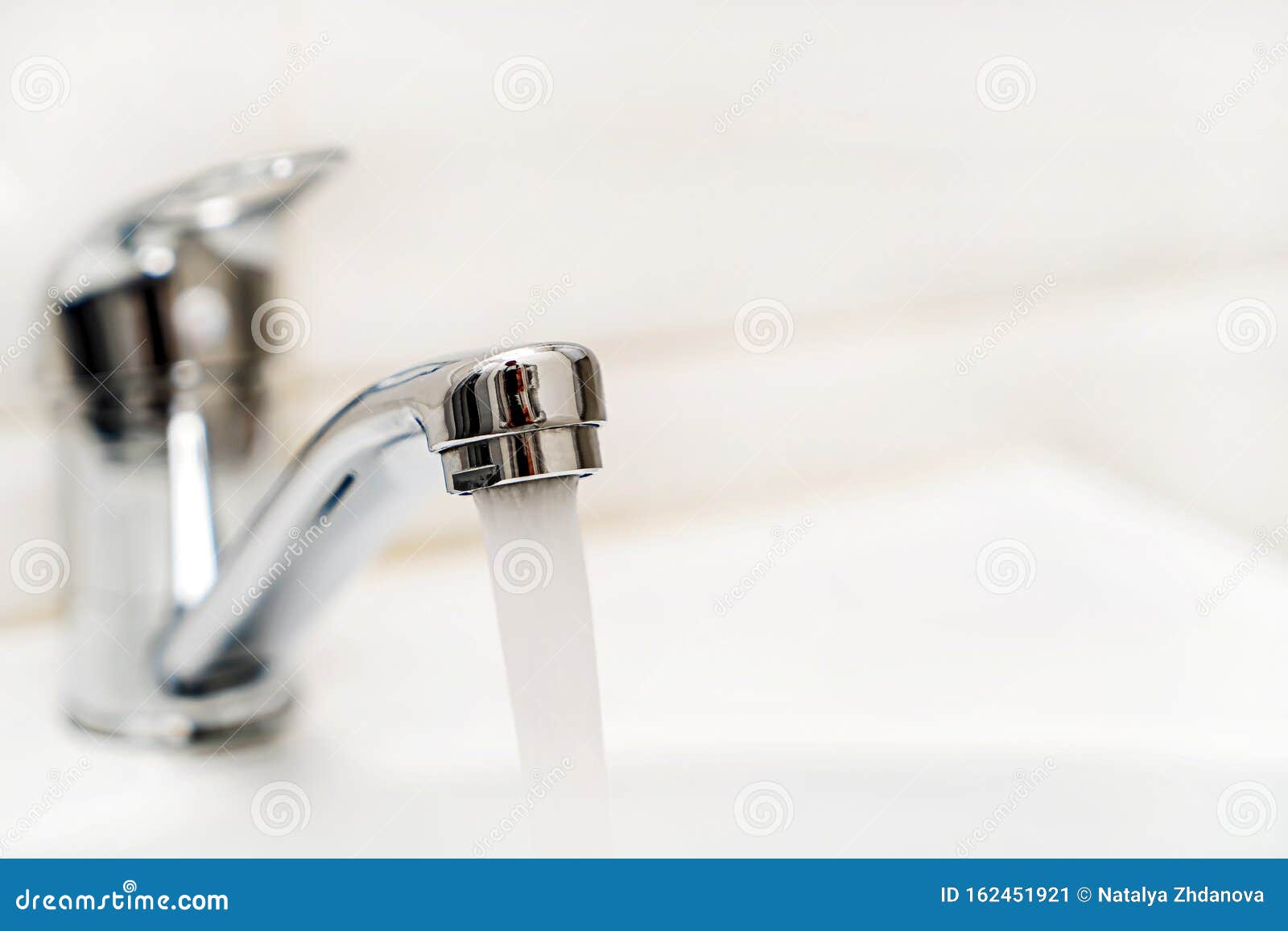Faucet in the bathroom stock image. Image of bathroom 162451921