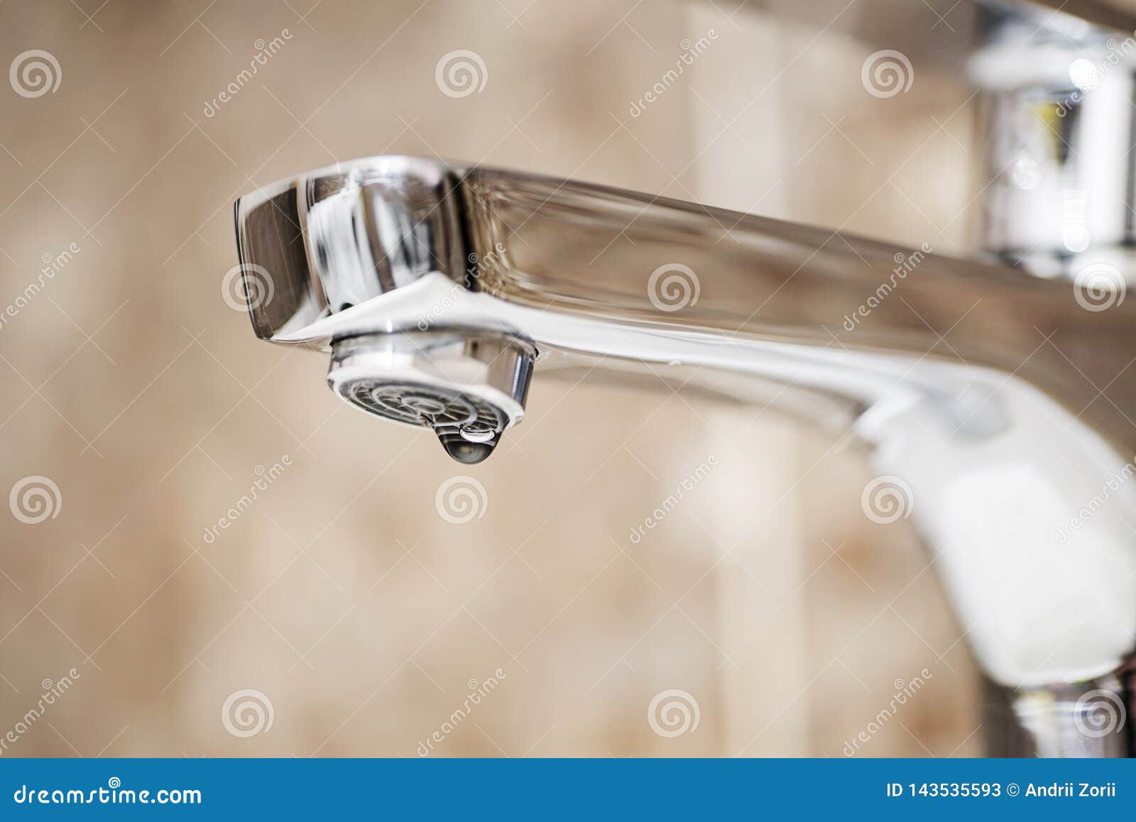 faucet with dripping water. tap closeup with dripping water-drop. water leaking, saving concept