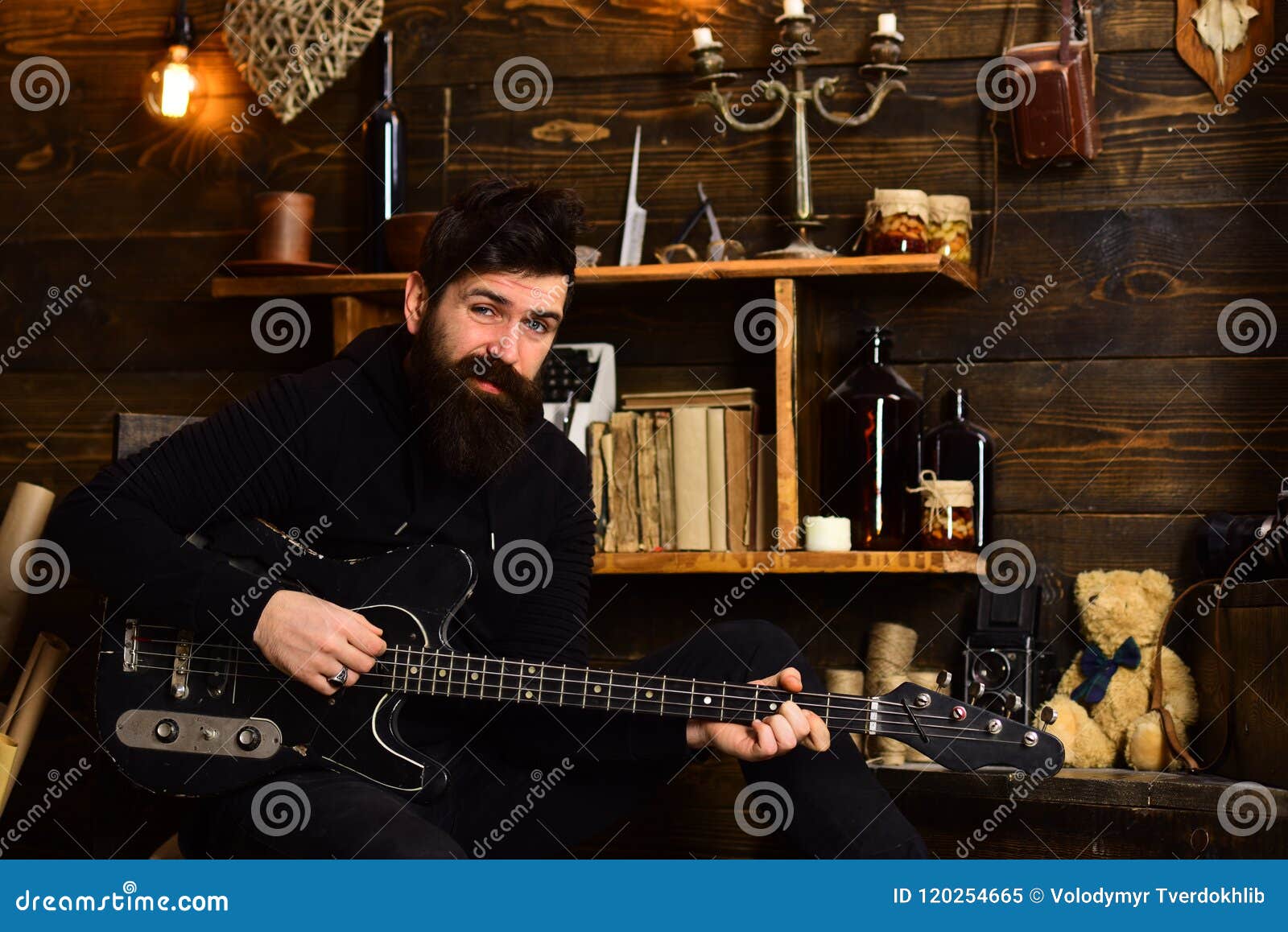 Favourite Activity. Man Bearded Musician Enjoy Evening with Bass Guitar, Wooden Background Stock Image - Image of beard, dark: 120254665 Favourite Activity. Man Bearded Musician Enjoy Evening with Bass Guitar, Wooden Background Stock Image - Image of beard, dark: 120254665