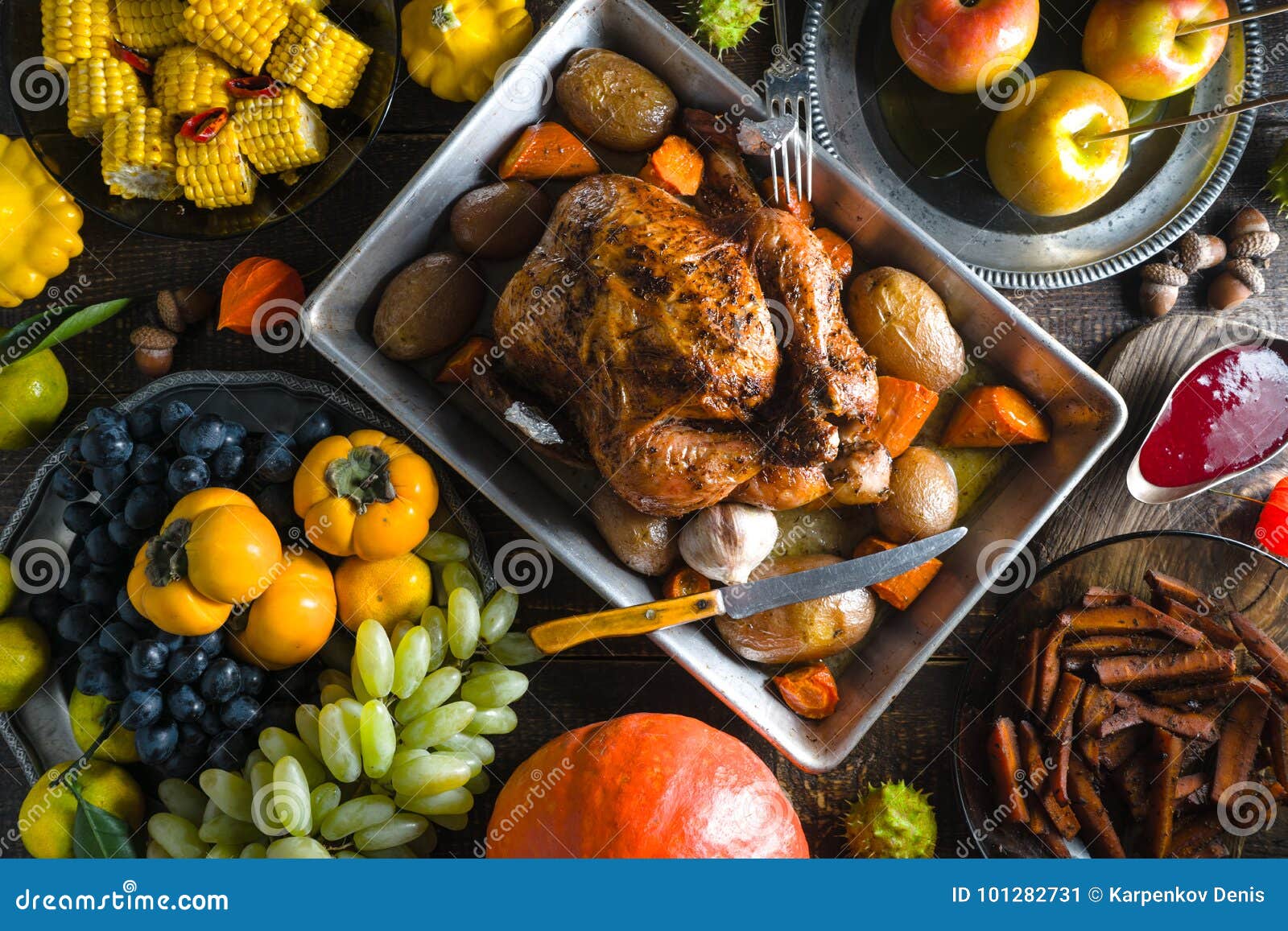 feast with turkey on thanksgiving, vegetables and fruits