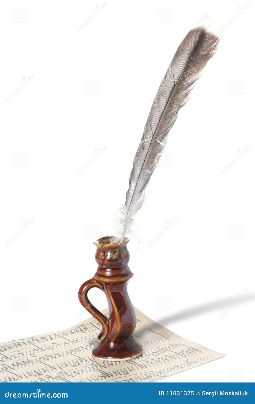 Feather and music sheet stock image. Image of stylus 11631325