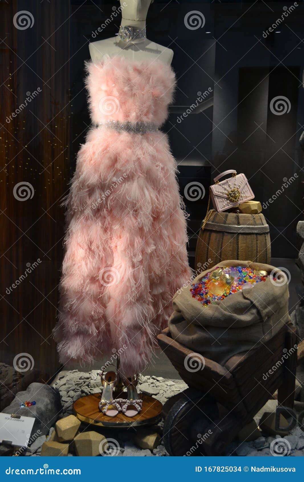 Feather Pink Lady`s Dress Exposed in the Dolce & Gabbana Boutique.  Editorial Stock Image - Image of accessory, detail: 167825034