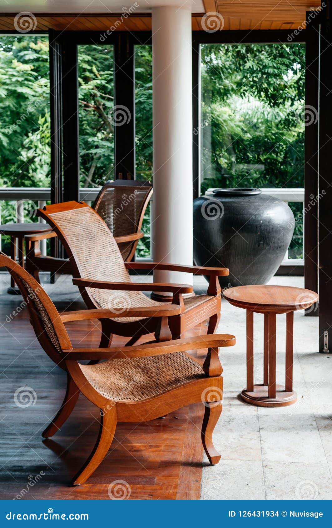 Contemporary Colonial Style Living Room With Vintage Rattan