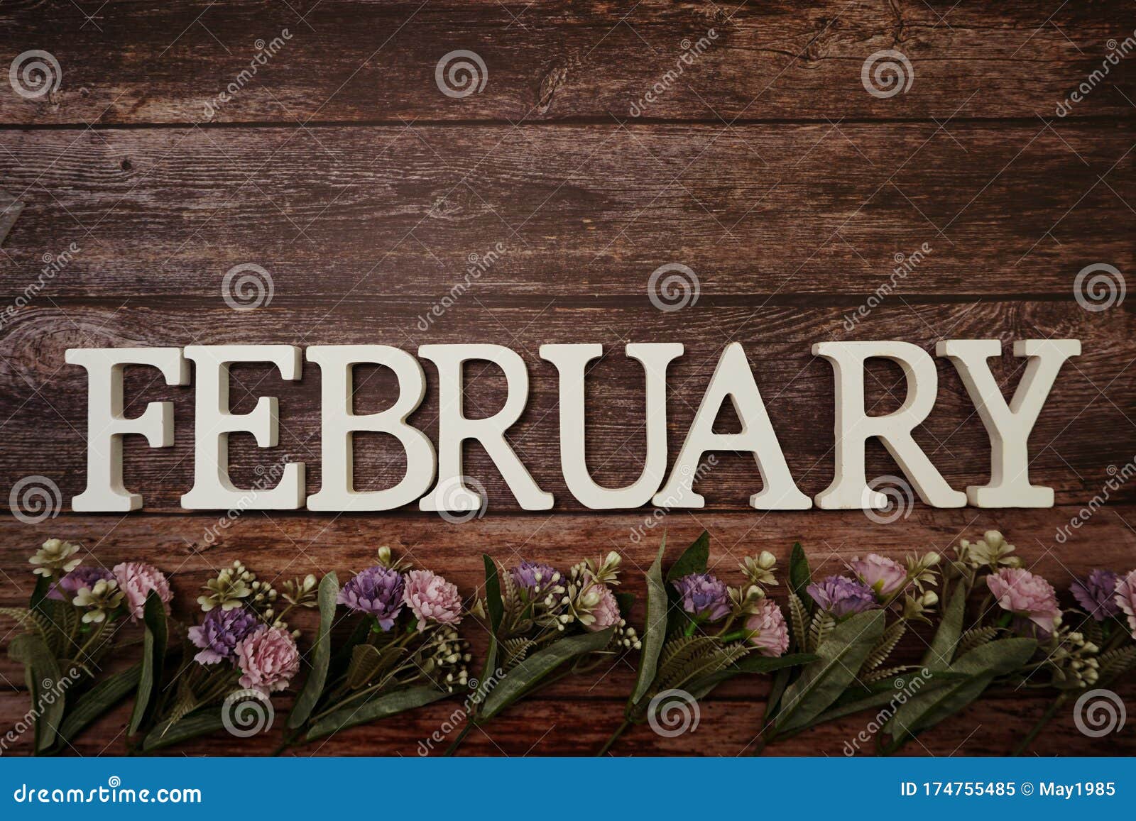 February Alphabet Letters With Flower Decoration On Wooden Background