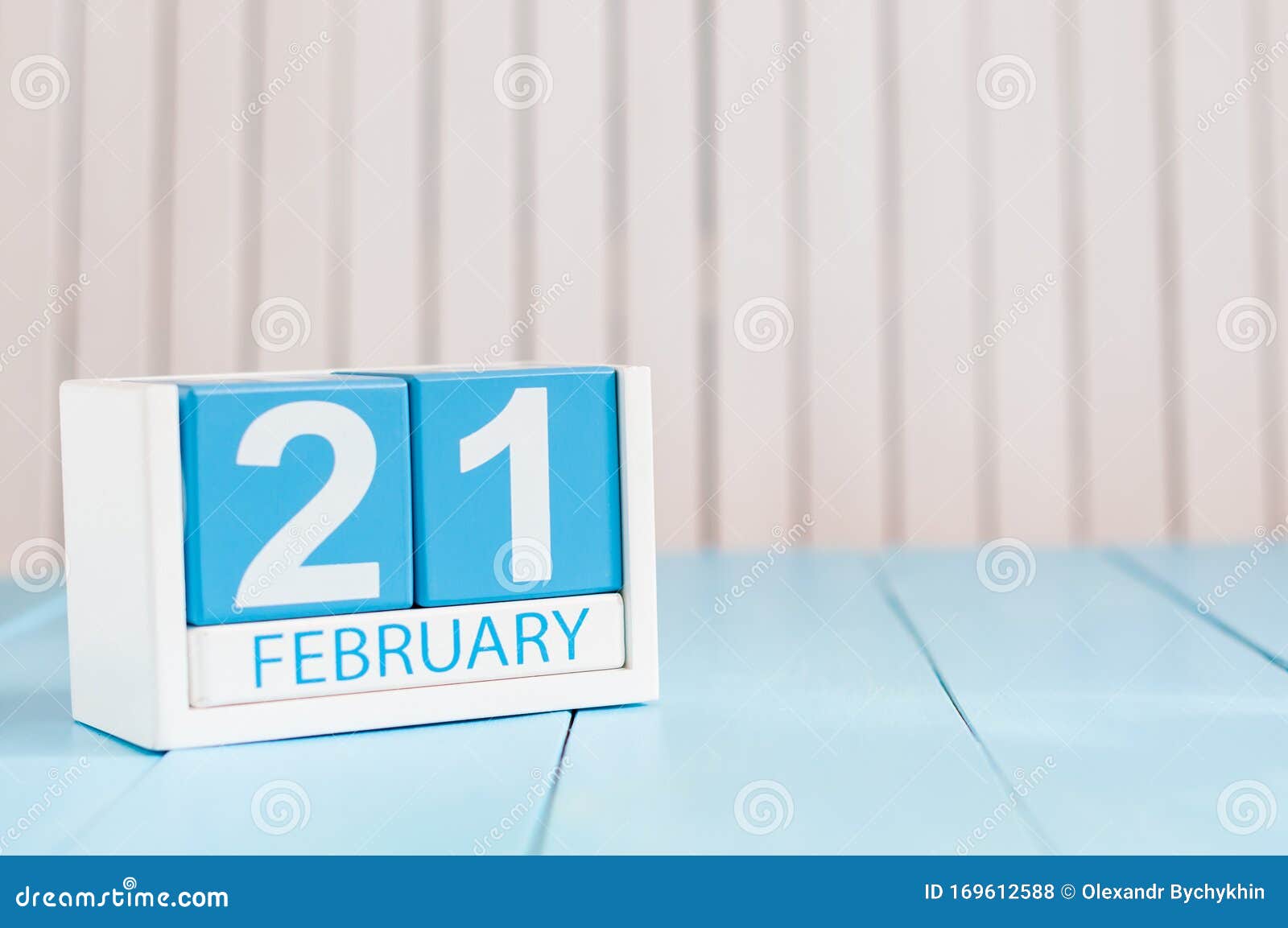 February 21st. Day 21 of Month, Calendar on Wooden Background. Winter