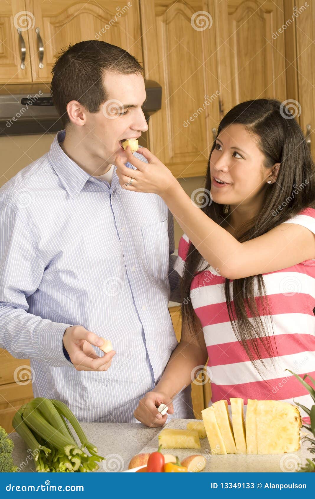 Feeding Husband Stock Pho pic