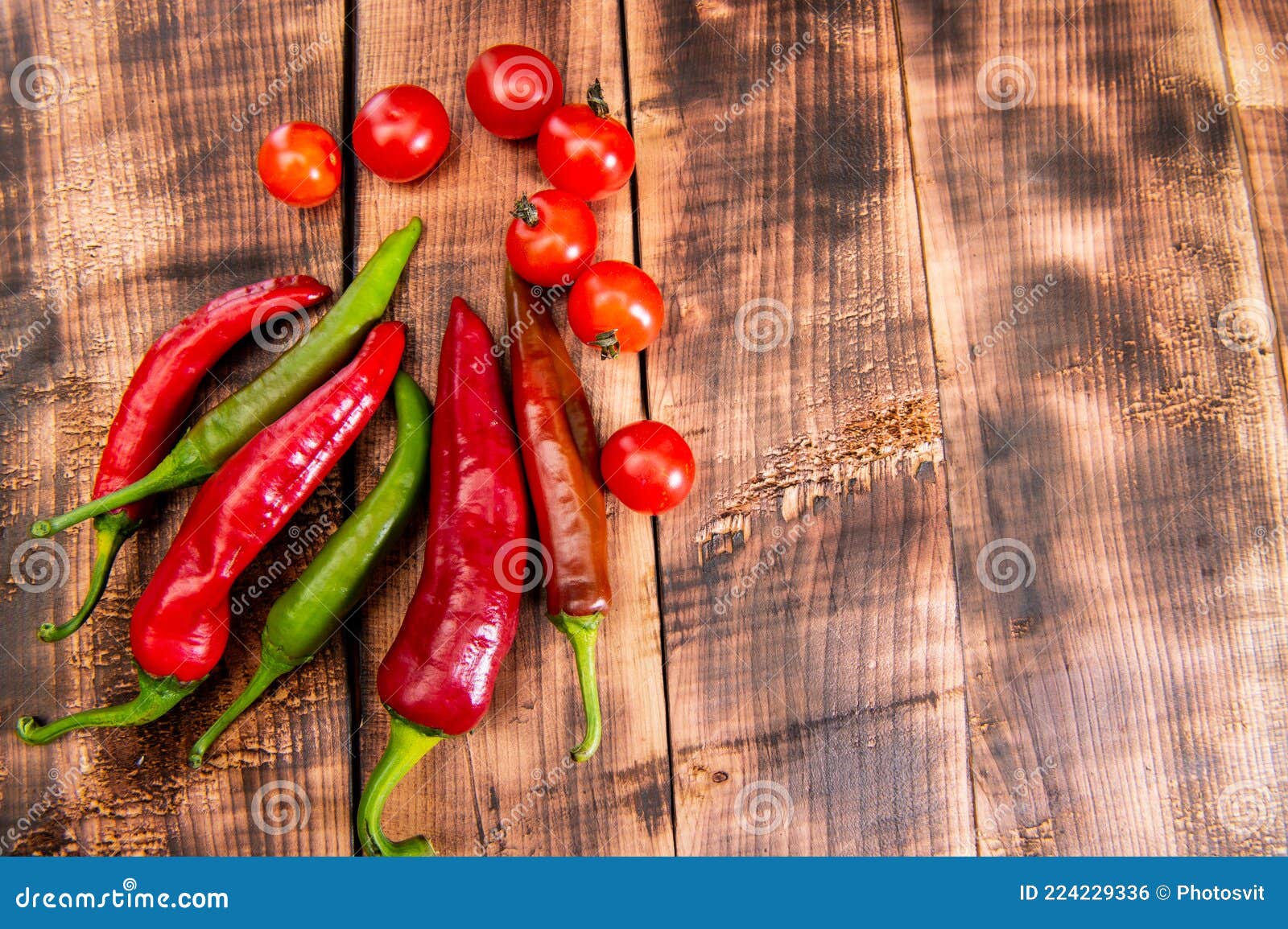 feel the piquancy. chili peppers and cherry tomatoes. red and green vegetables. organic vegetables