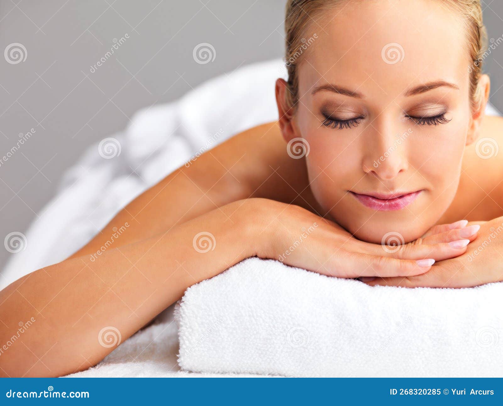 Feeling Completely Relaxed A Beautiful Young Woman Relaxing In A Spa Stock Image Image Of