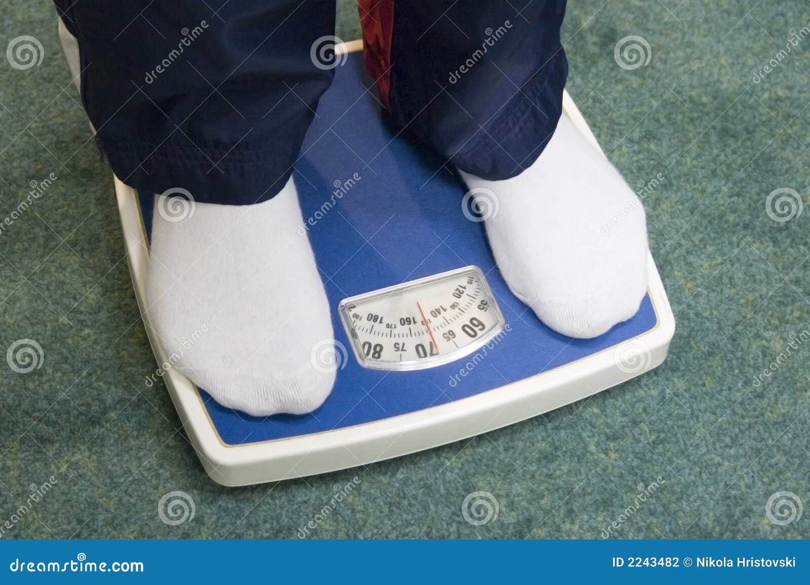 Feet on bathroom scale stock photo. Image of balance, isolated 2243482