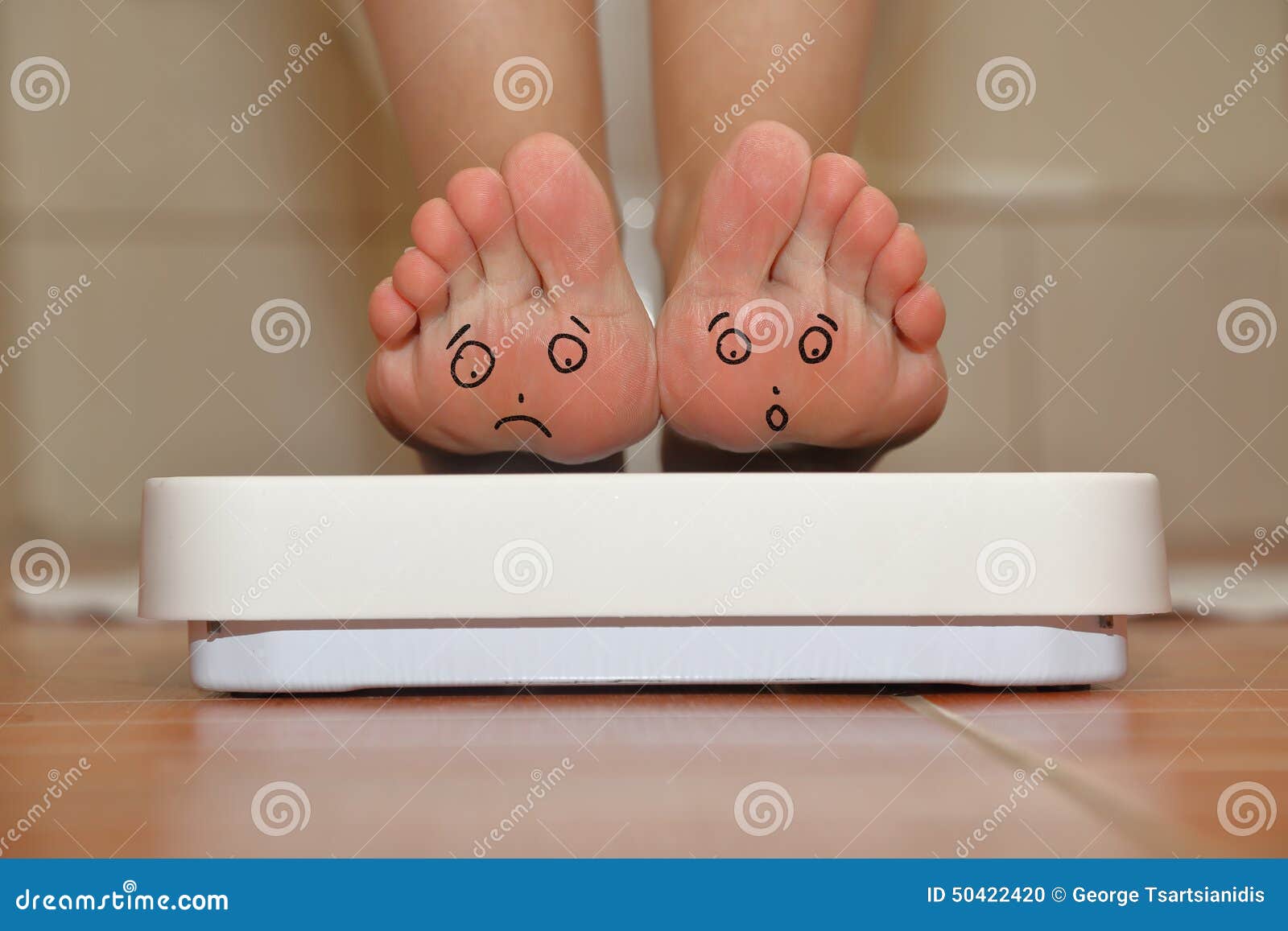 feet on bathroom scale