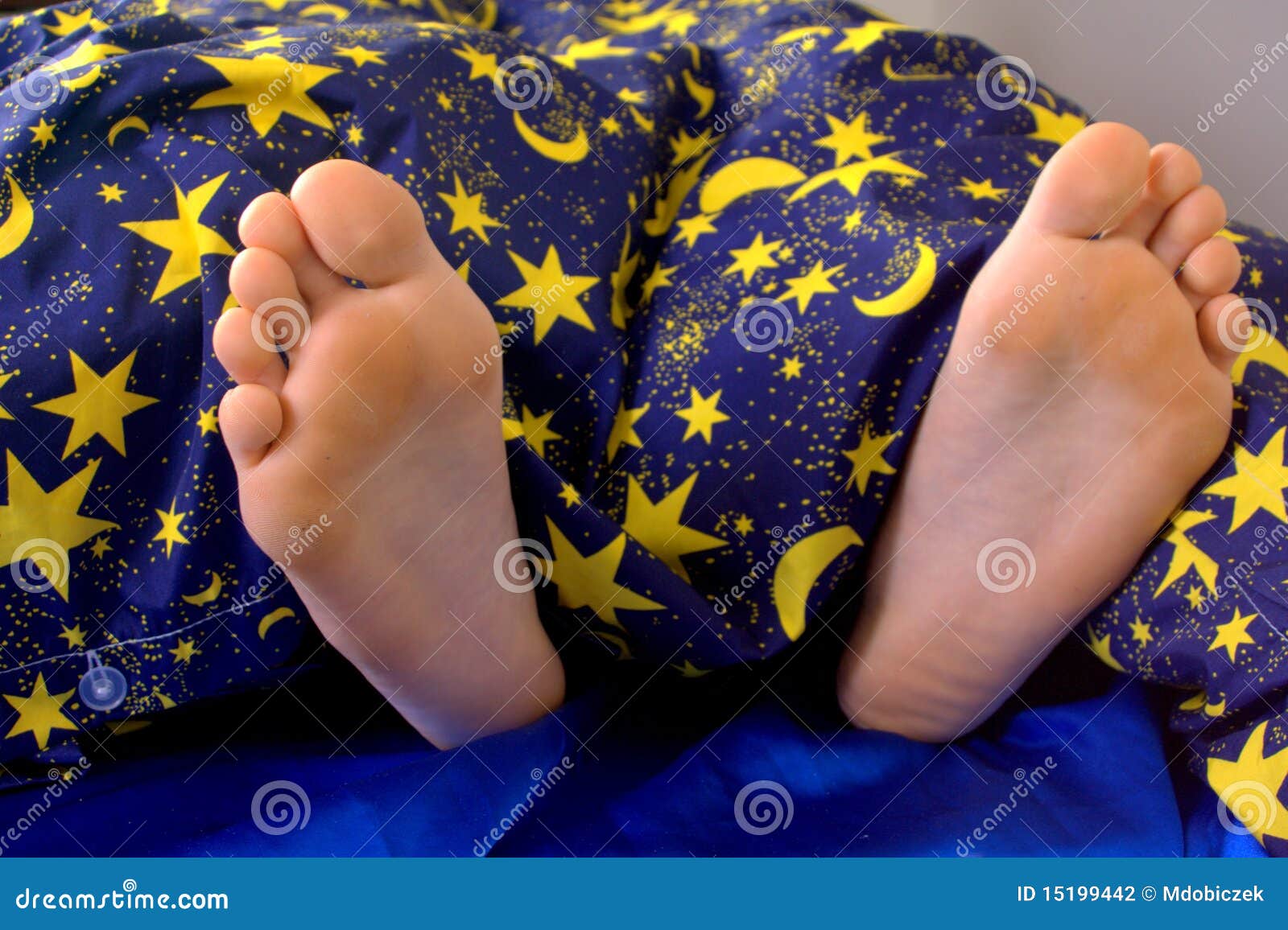 Feet in bed stock photo. Image of indoor, preson, inside - 15199442