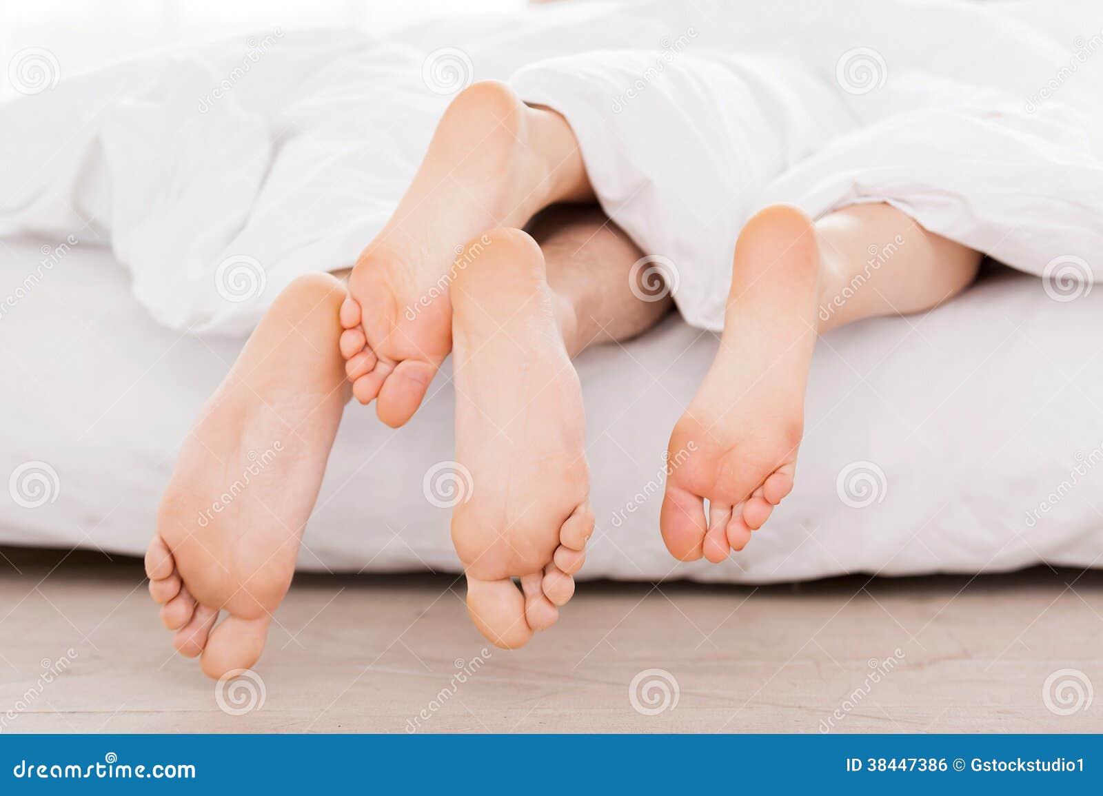 Feet from the blanket. stock photo. Image of human, sleeping - 38447386