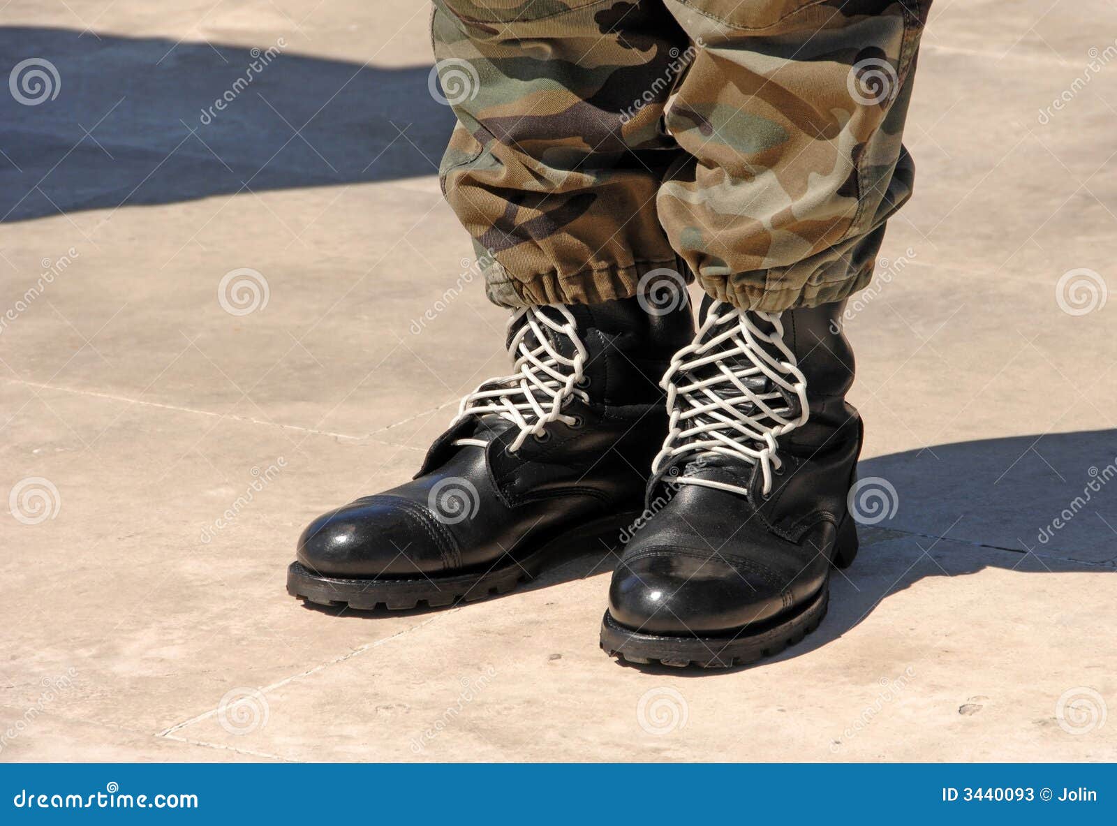 feet of camouflaged soldier