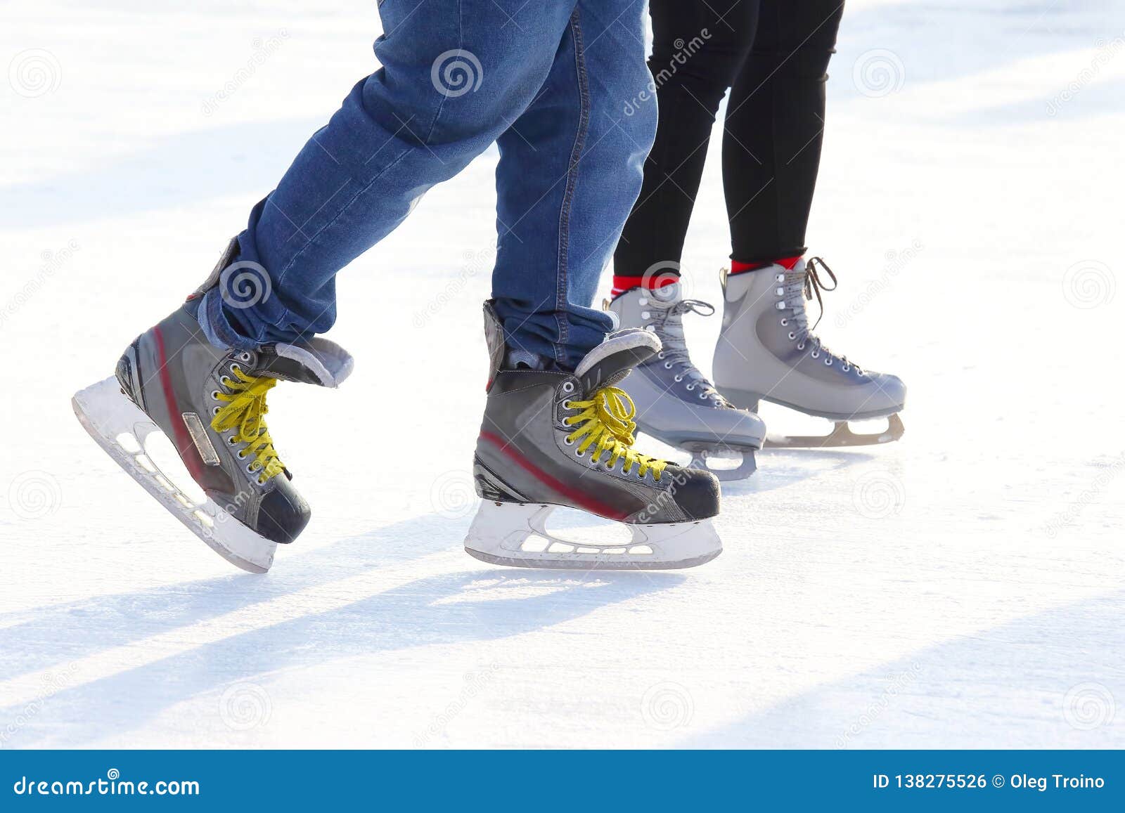 Feet of Different People Skating on the Ice Rink Stock Photo Image of