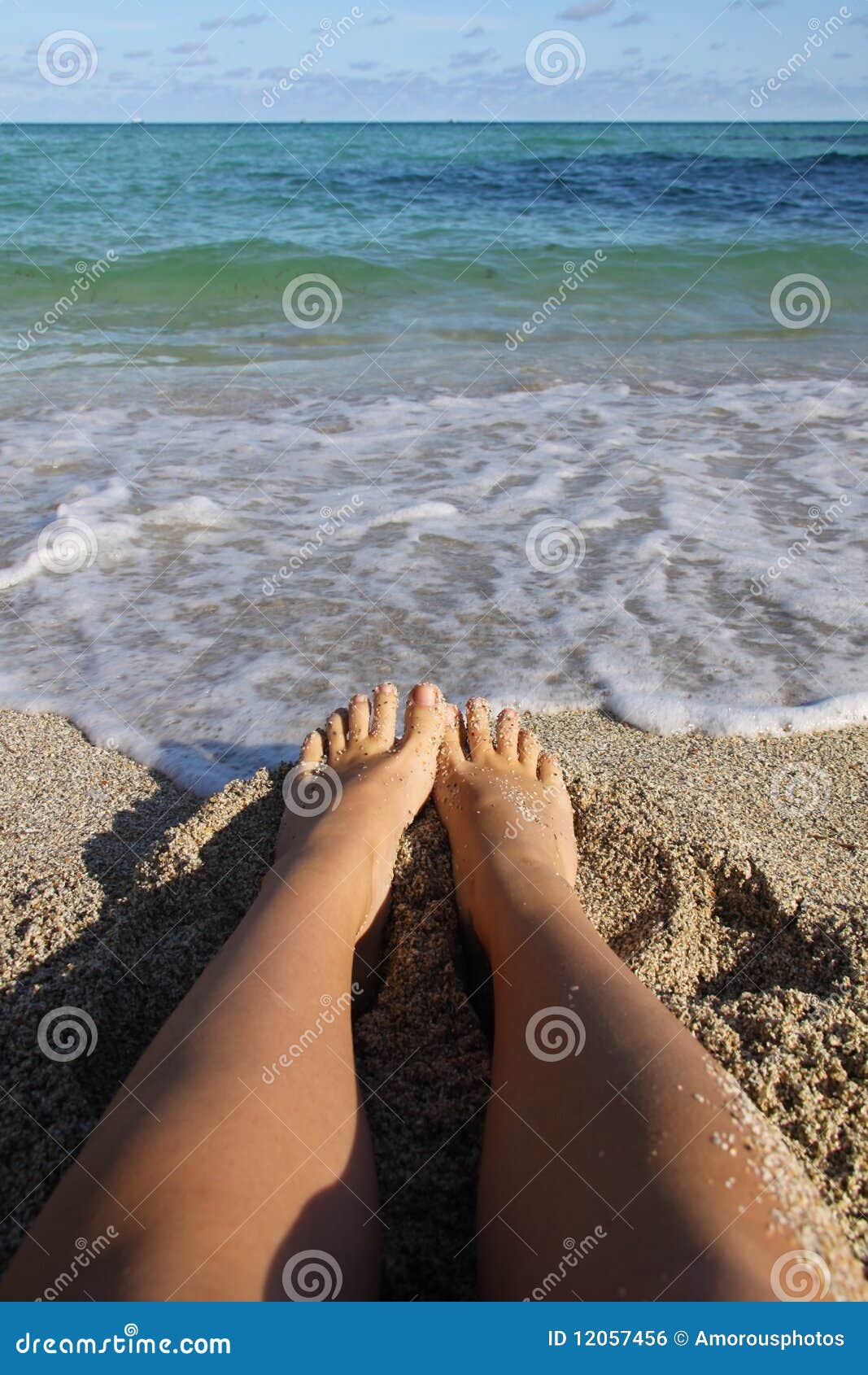 Feet in Florida Sands stock photo. Image of legs, waves - 12057456