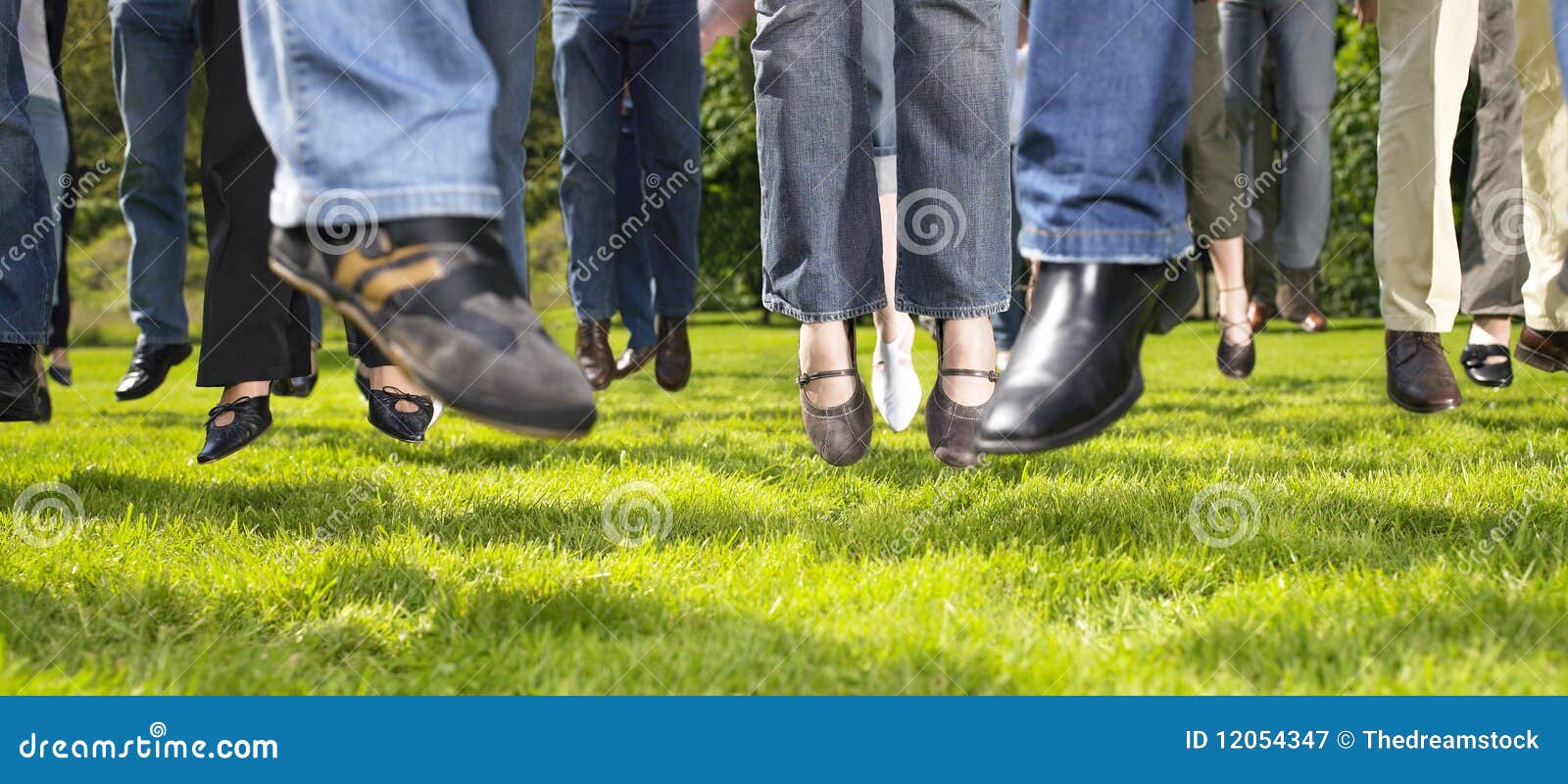 Feet Jumping on the Grass stock image. Image of excitement 12054347