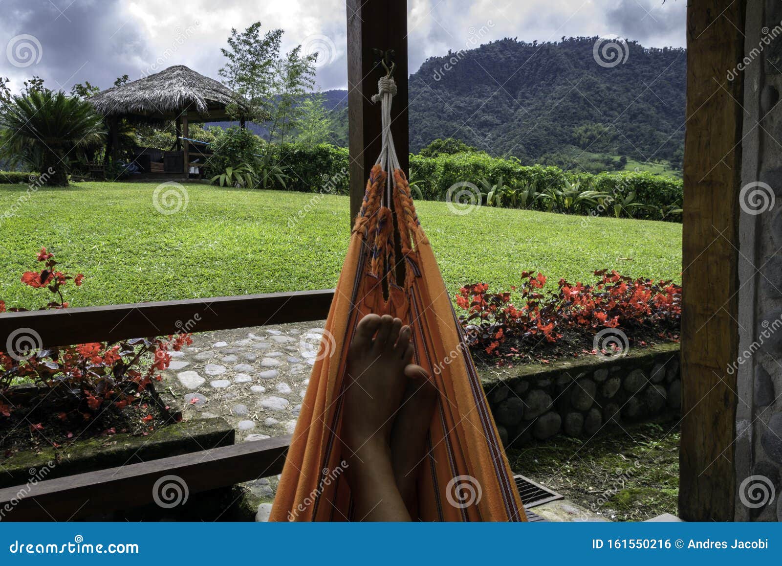 feet of a person in a paraguayan hammock resting, contemplating the landscape