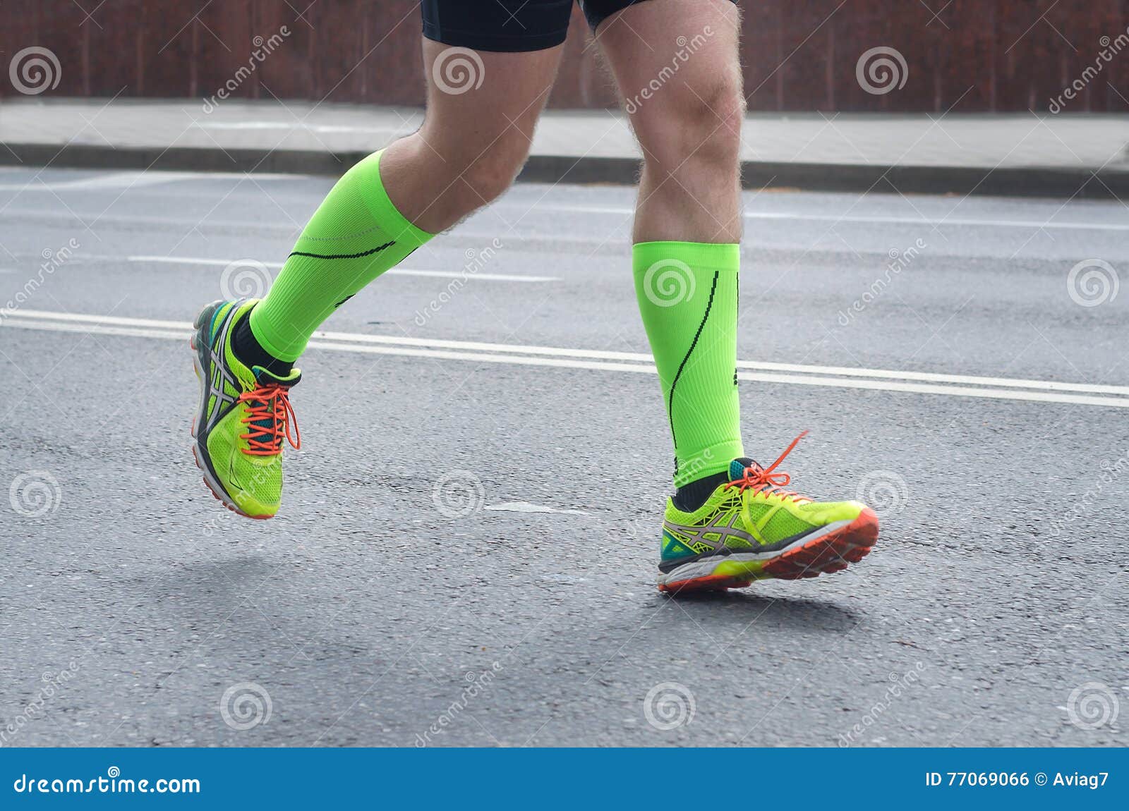 Feet of a Running Man. stock photo. Image of road, person - 77069066