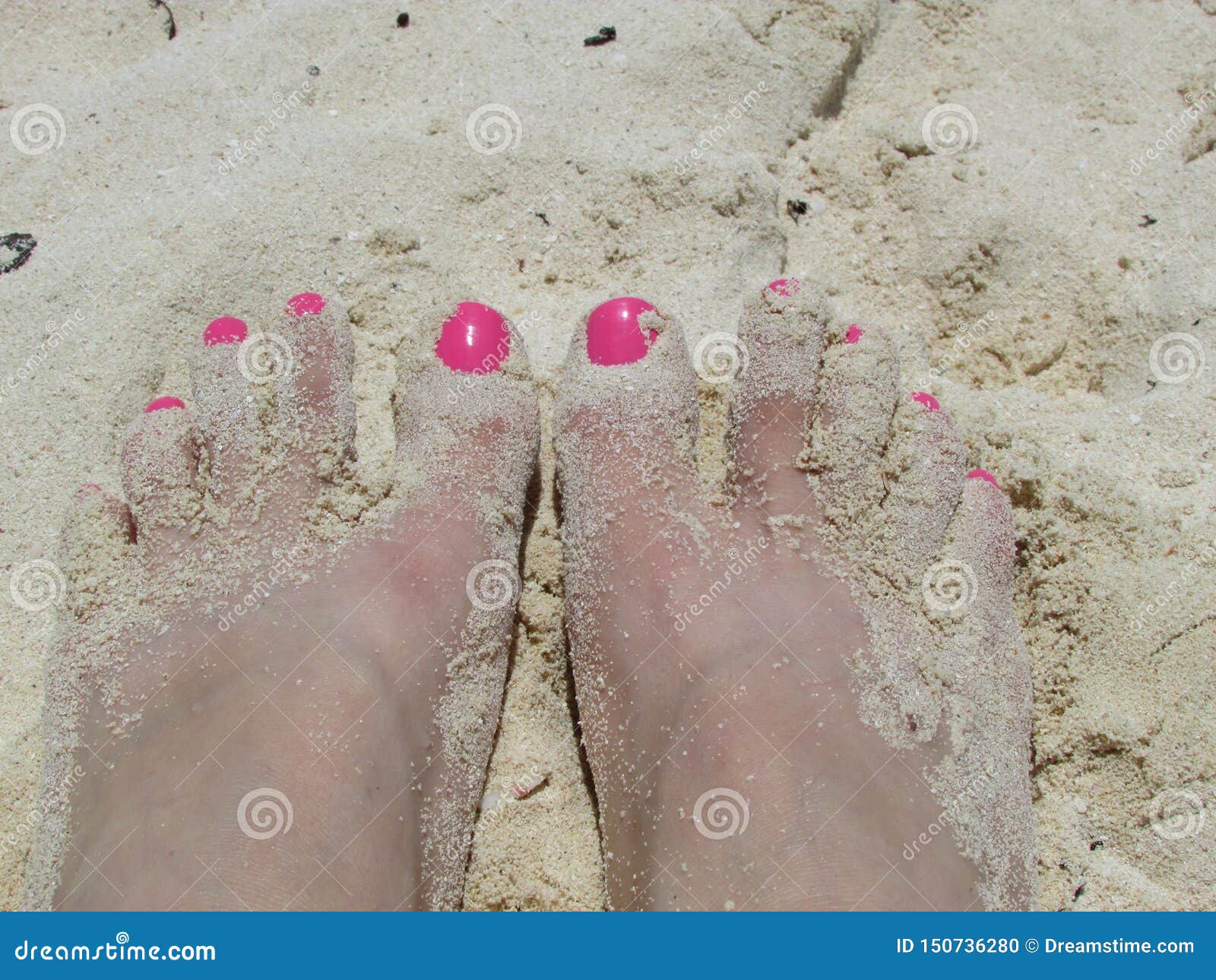 feet in the sand