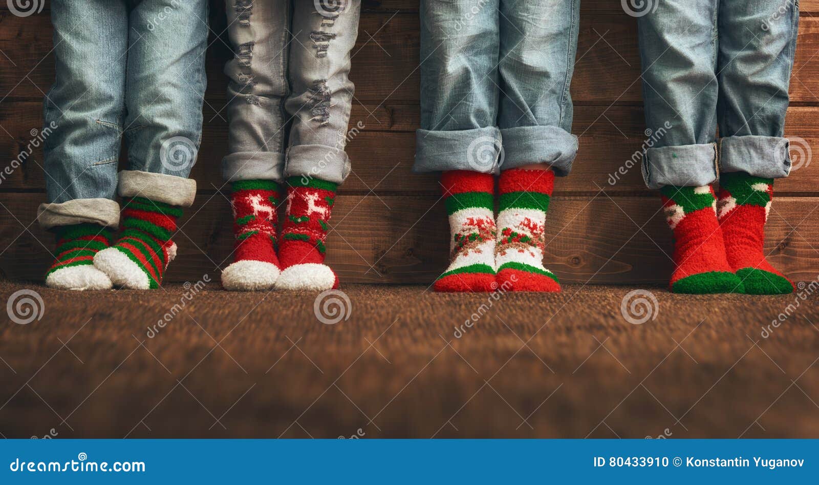 Feet in Socks with a Christmas Ornament Stock Photo - Image of party ...