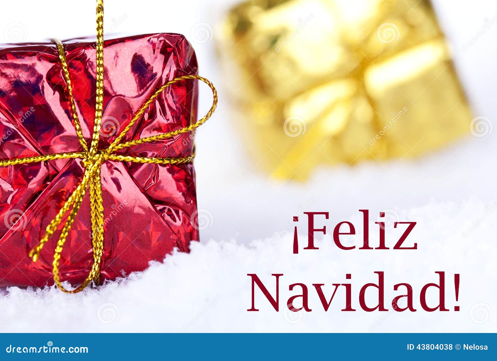 Feliz Navidad in the Snow with Gifts Stock Photo - Image of holiday, navidad: 43804038
