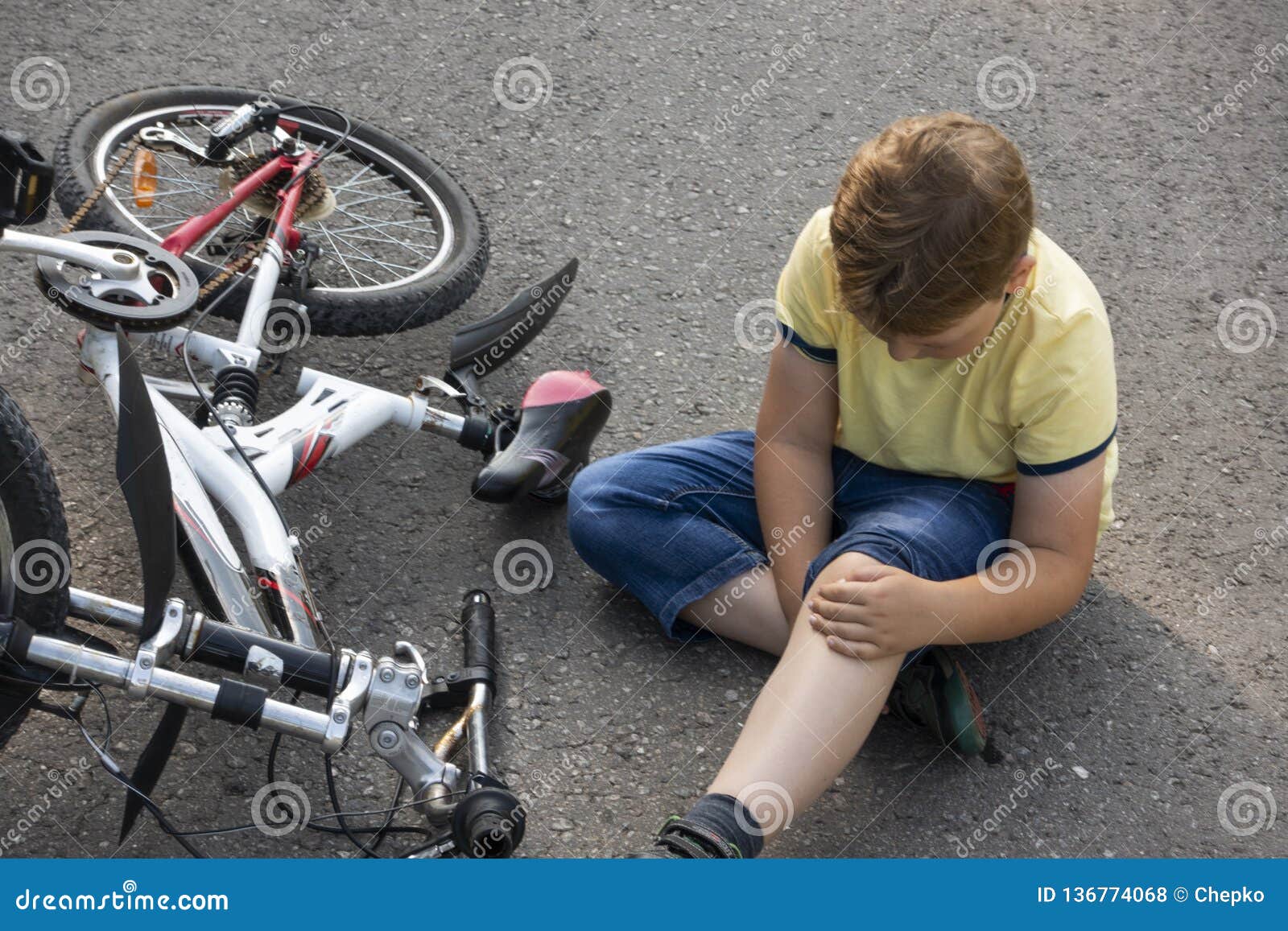 Biker Fell From A Bike, Using A Bandage From His First Aid Kit To Help