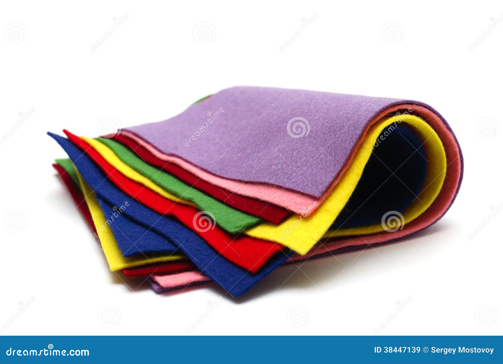 Close-up of felt fabric sheets stacked on top of each other in the colors  of the rainbow spectrum Stock Photo by Yuliasis