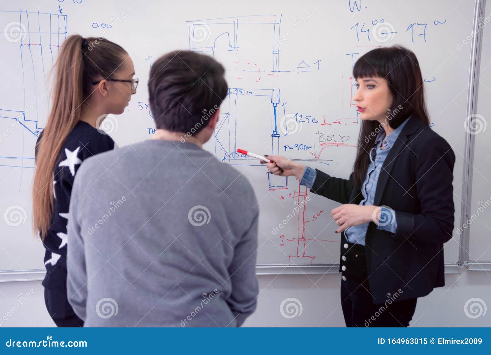 Female Architecture Teacher at Work. Female Professor Explain Architectural Projects To Students