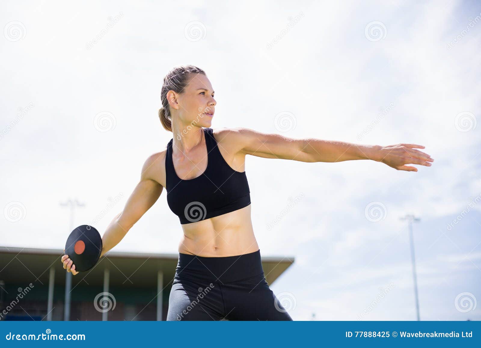 Female Athlete about To Throw a Discus Stock Image Image of