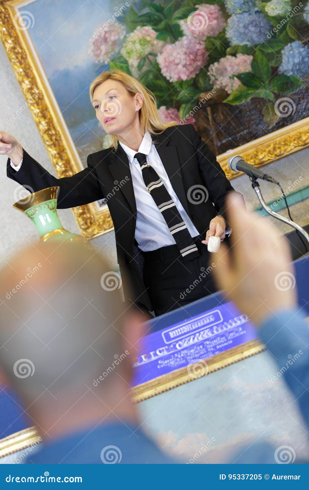 Female Auctioneer Directing Bids Stock Image Image of symbol, heading
