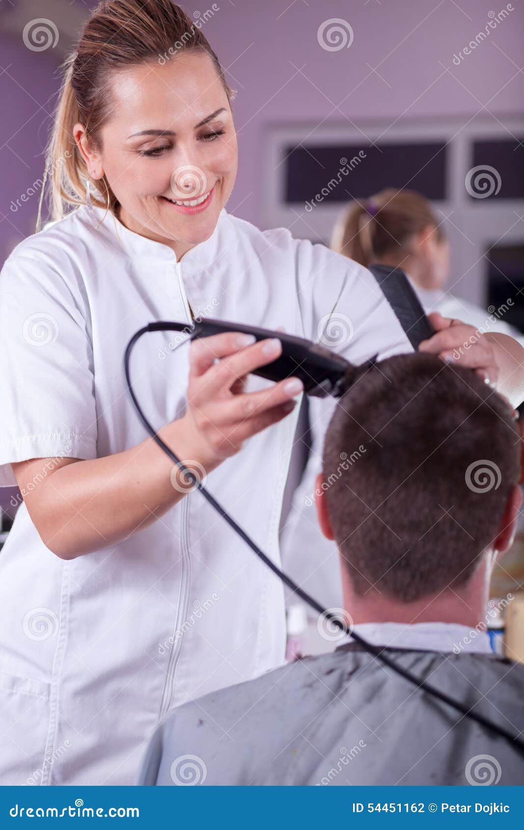 Female Barber Cutting Hair With Clipper Stock Photo Image