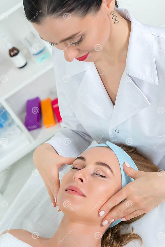 Female Beautician Doctor With Patient In Wellness Center Professional Cosmetologist Make