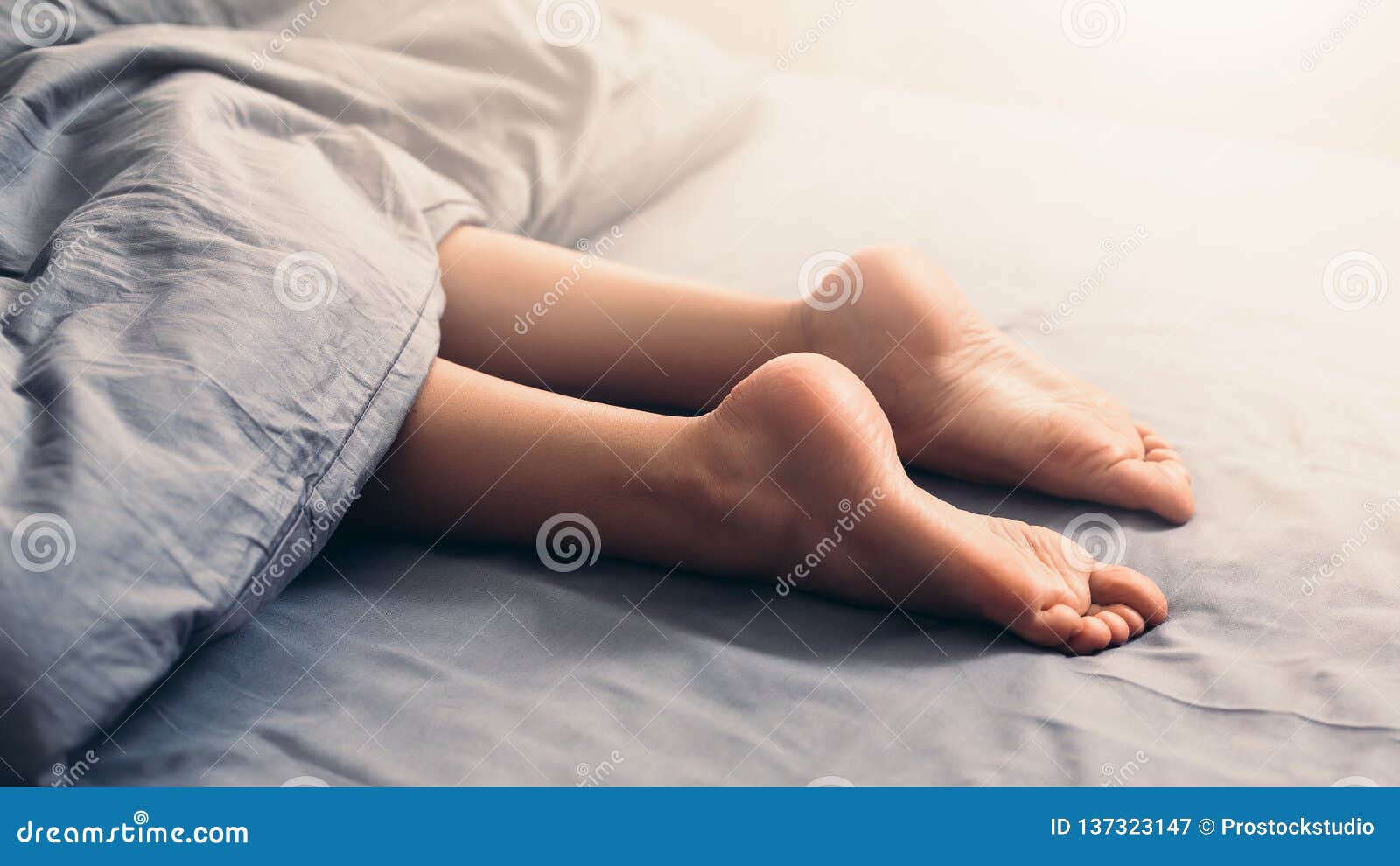 Female Beautiful Feet Under Blanket In Bed Stock Image Image Of