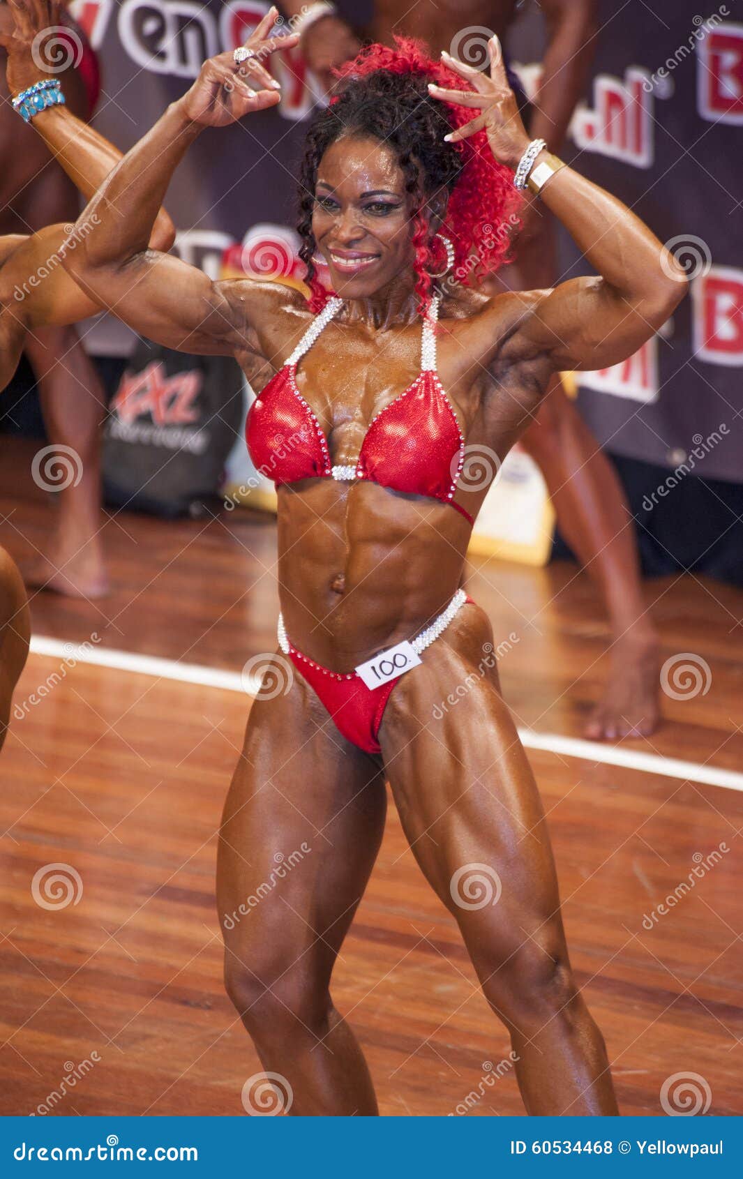 Female Bodybuilder in Double Biceps Pose and Red Editorial Photo Image of editorial, medal: 60534468