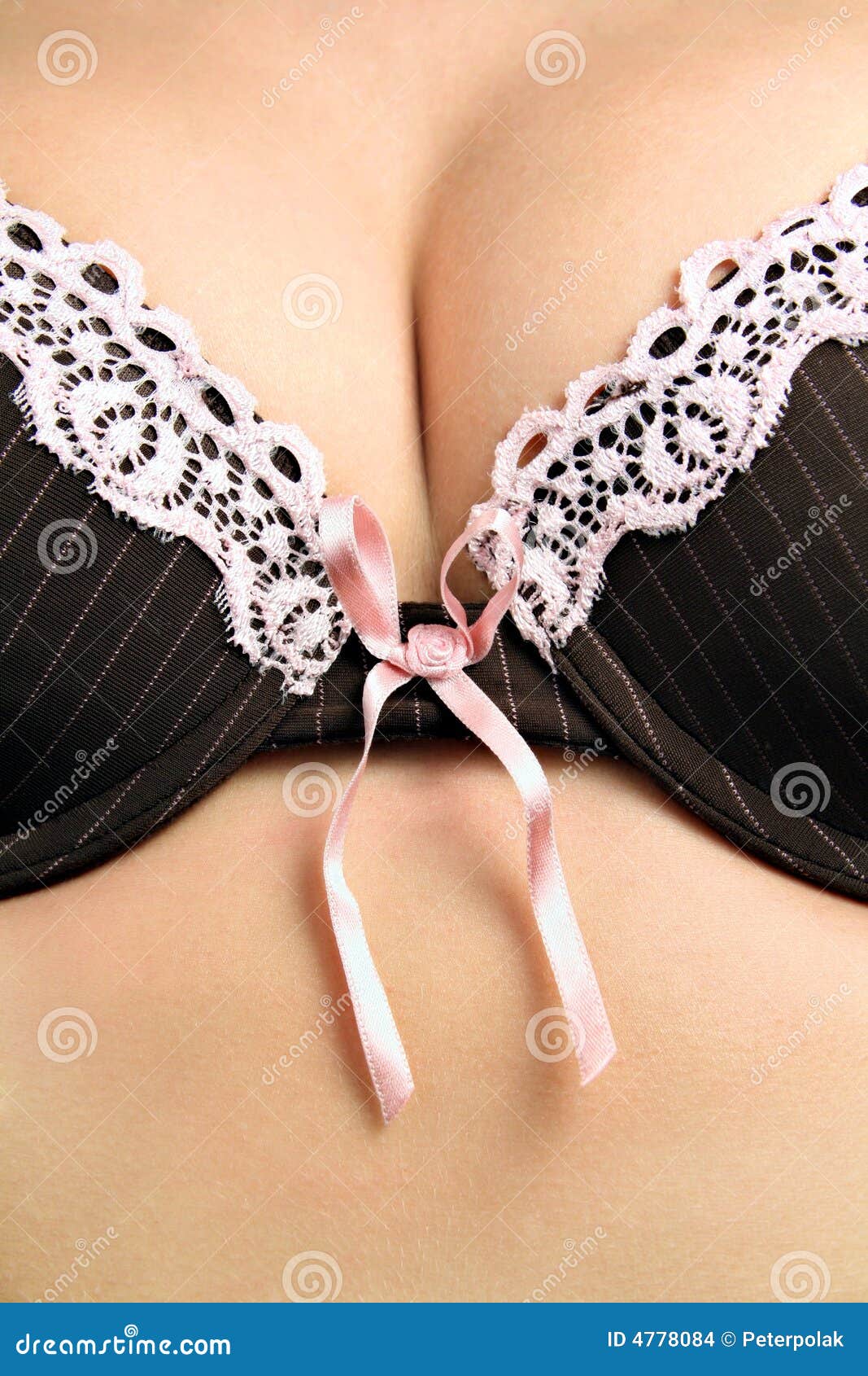 https://thumbs.dreamstime.com/z/female-breasts-black-bra-4778084.jpg