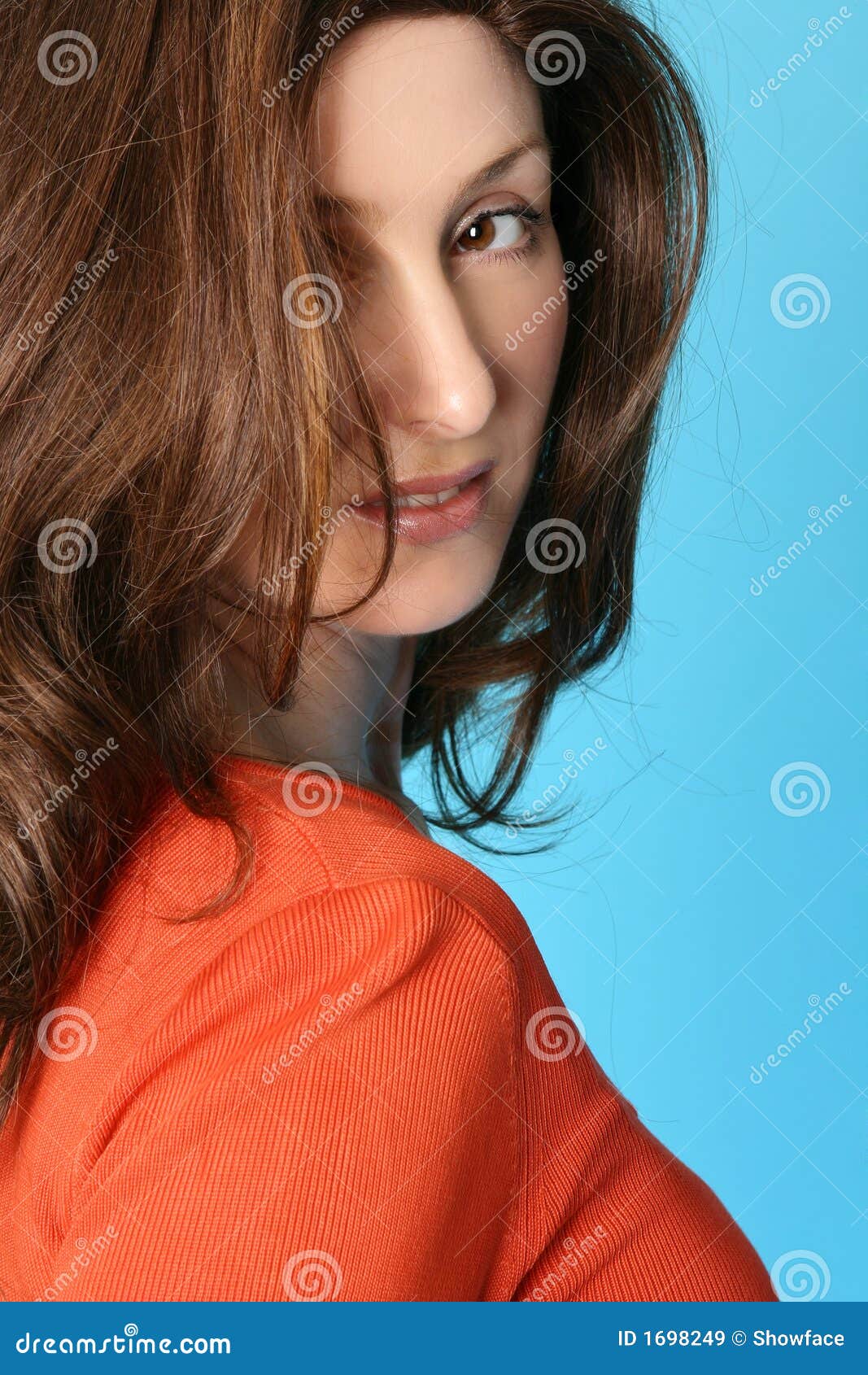 female with brown hair with auburn highlights