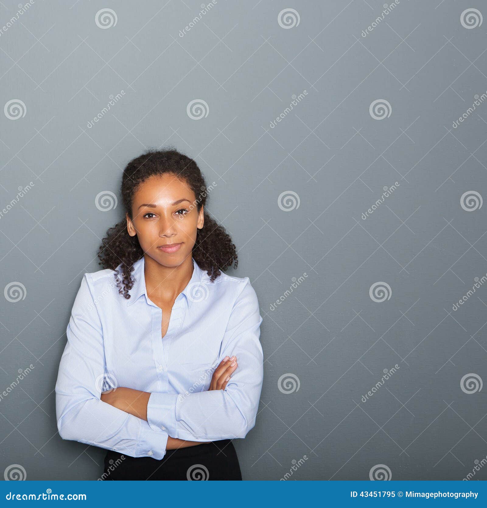 female business person with arms crossed