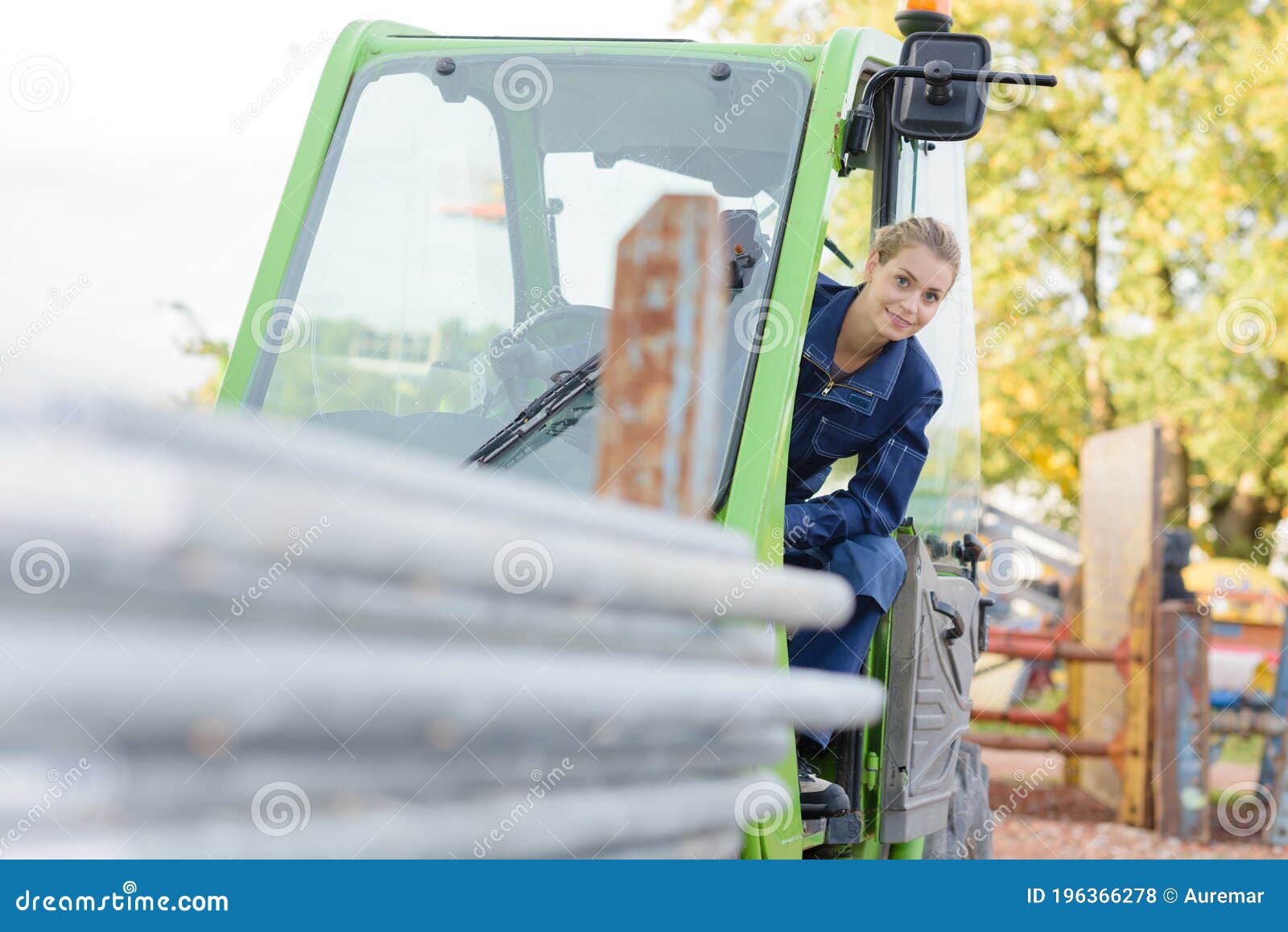 Female Construction Apprentice Learning To Drive Heavy Equipment Stock